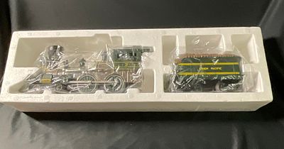 A Pair of Union Pacific 4-4-0 General Type Steam Locomotive and Tender Models. This set consists 