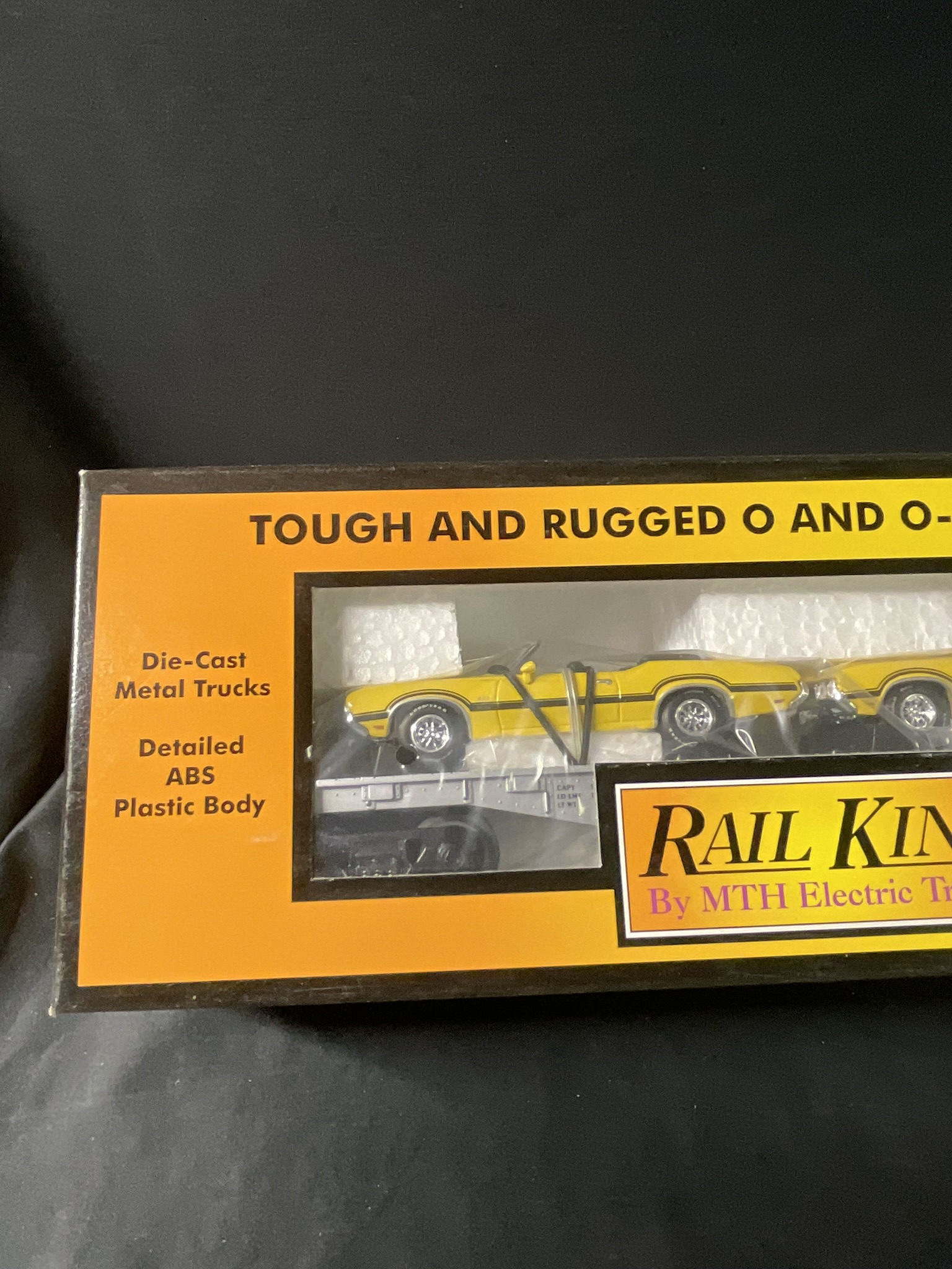 MTH RailKing Auto Transportation Flatcar with A Pair of Ertl 1970 Oldsmobile 442 Cars