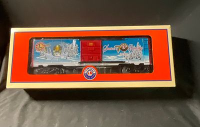 Lionel O Gauge 6-39332 Christmas Boxcar 2010. A Lionel O gauge model train boxcar, model number 