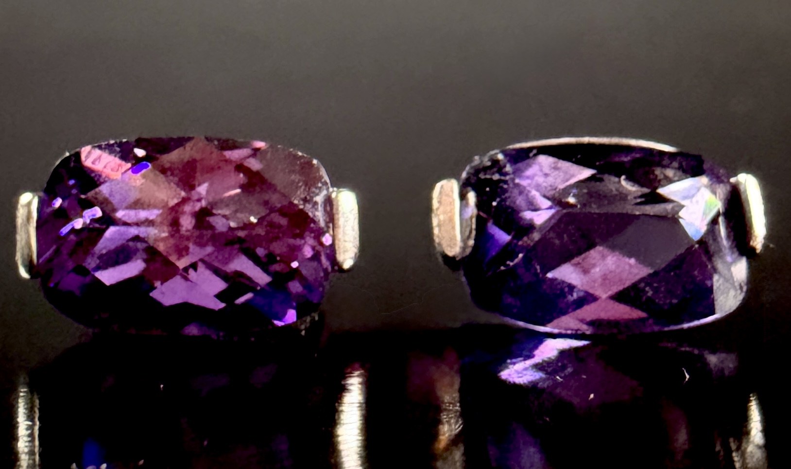 A Pair of Cushion-Cut Amethyst and Sterling Silver Stud Earrings