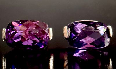 A Pair of Cushion-Cut Amethyst and Sterling Silver Stud Earrings. A matched pair of gemstone 