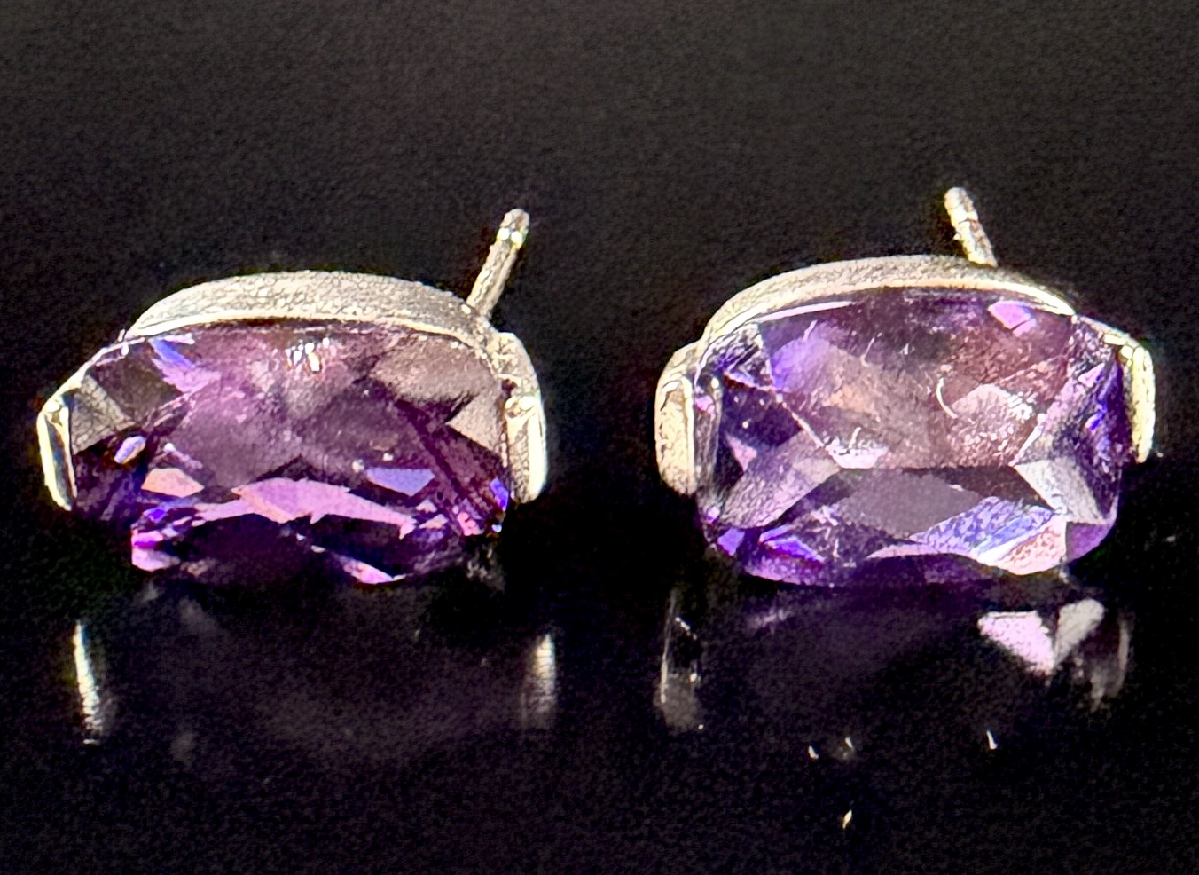 A Pair of Cushion-Cut Amethyst and Sterling Silver Stud Earrings