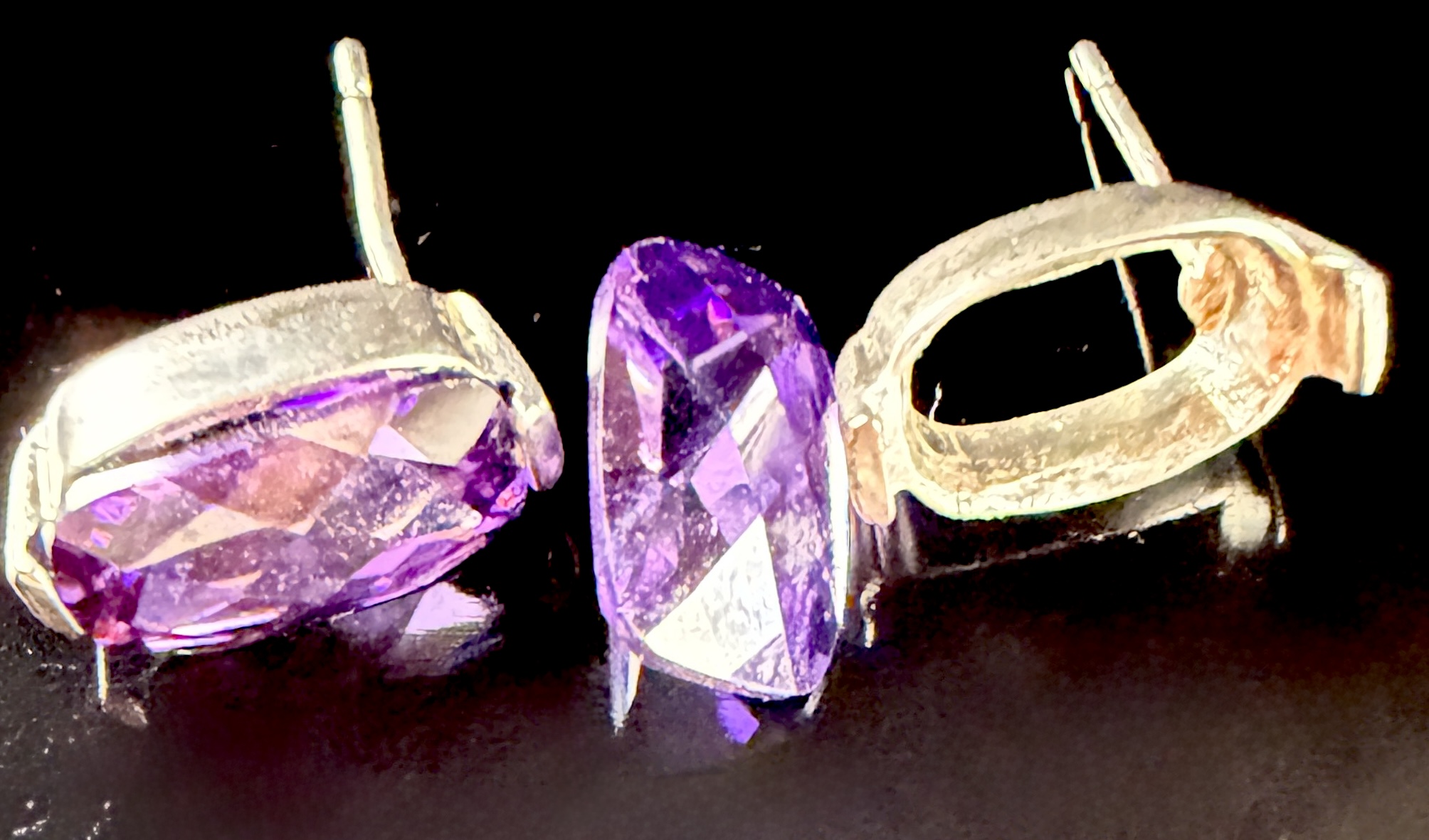 A Pair of Cushion-Cut Amethyst and Sterling Silver Stud Earrings