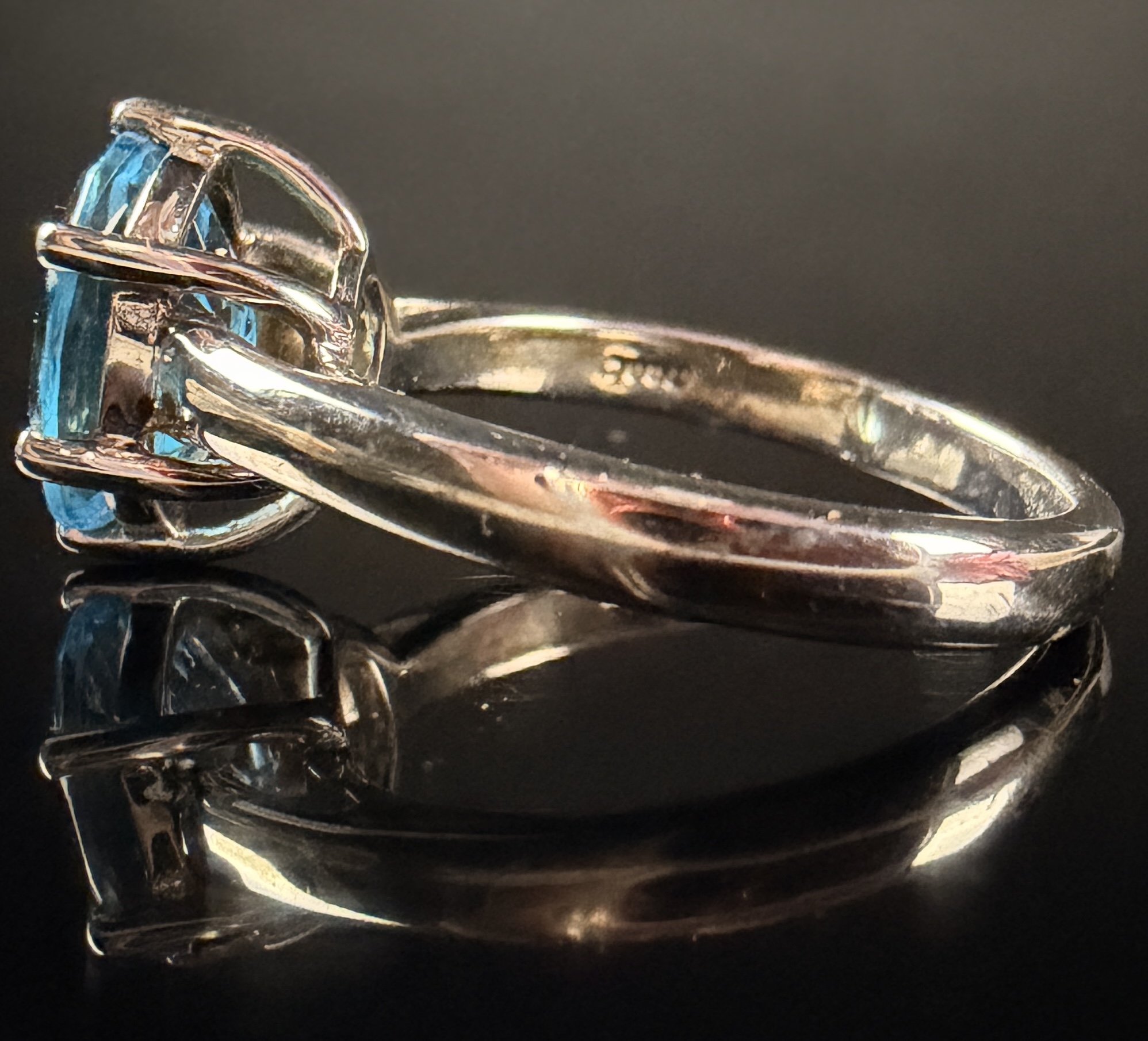 Sterling Silver and Oval Cut Light Blue Gemstone Solitaire Ring