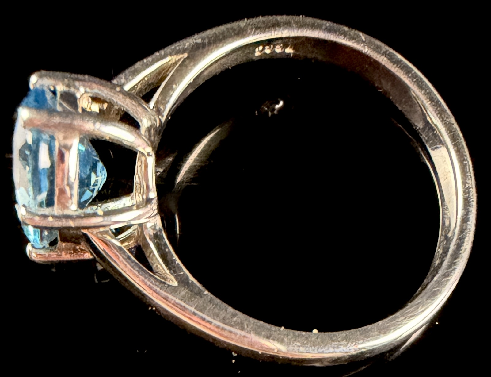 Sterling Silver and Oval Cut Light Blue Gemstone Solitaire Ring