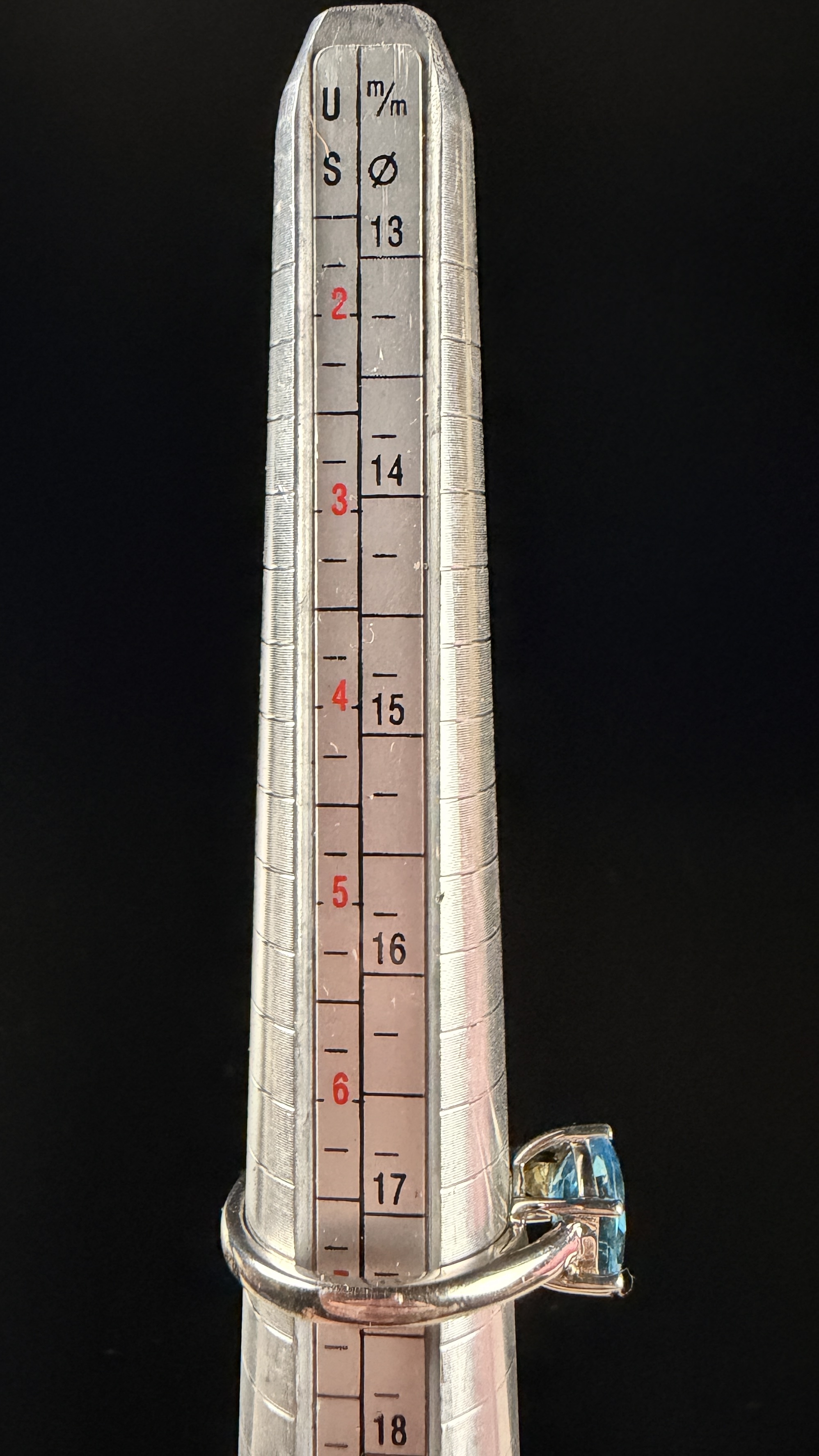 Sterling Silver and Oval Cut Light Blue Gemstone Solitaire Ring