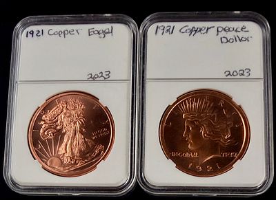 A Pair of US .999 Fine 1 Ounce Copper Bullion Rounds. A pair of private issue copper bullion 