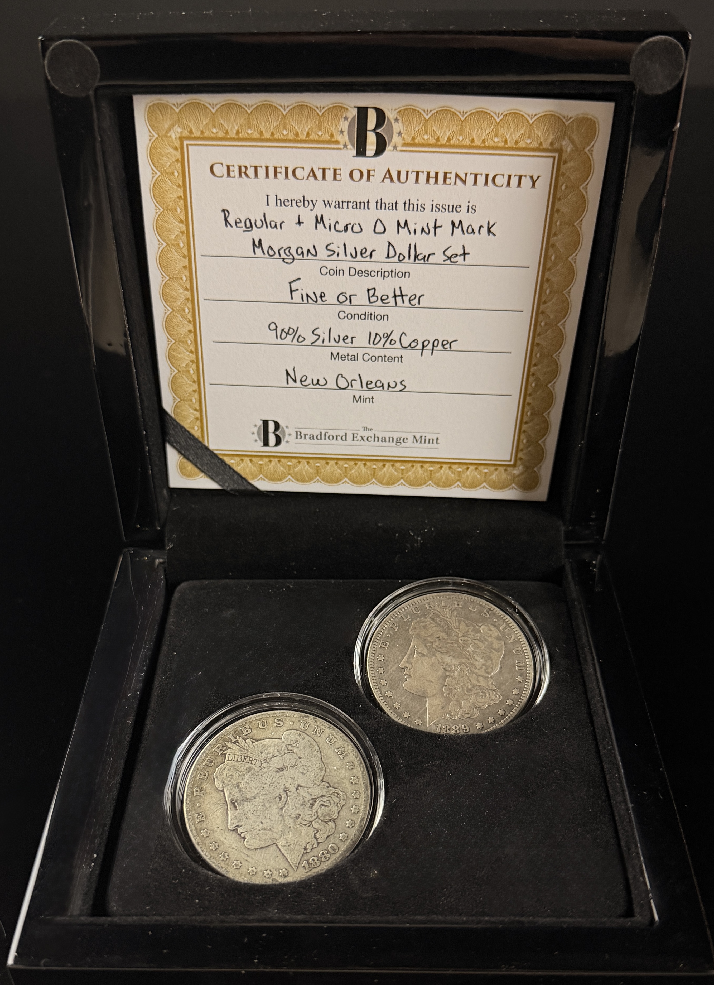 A Pair of US Morgan Silver Dollars, 1880-O and 1889-O Micro O Variety