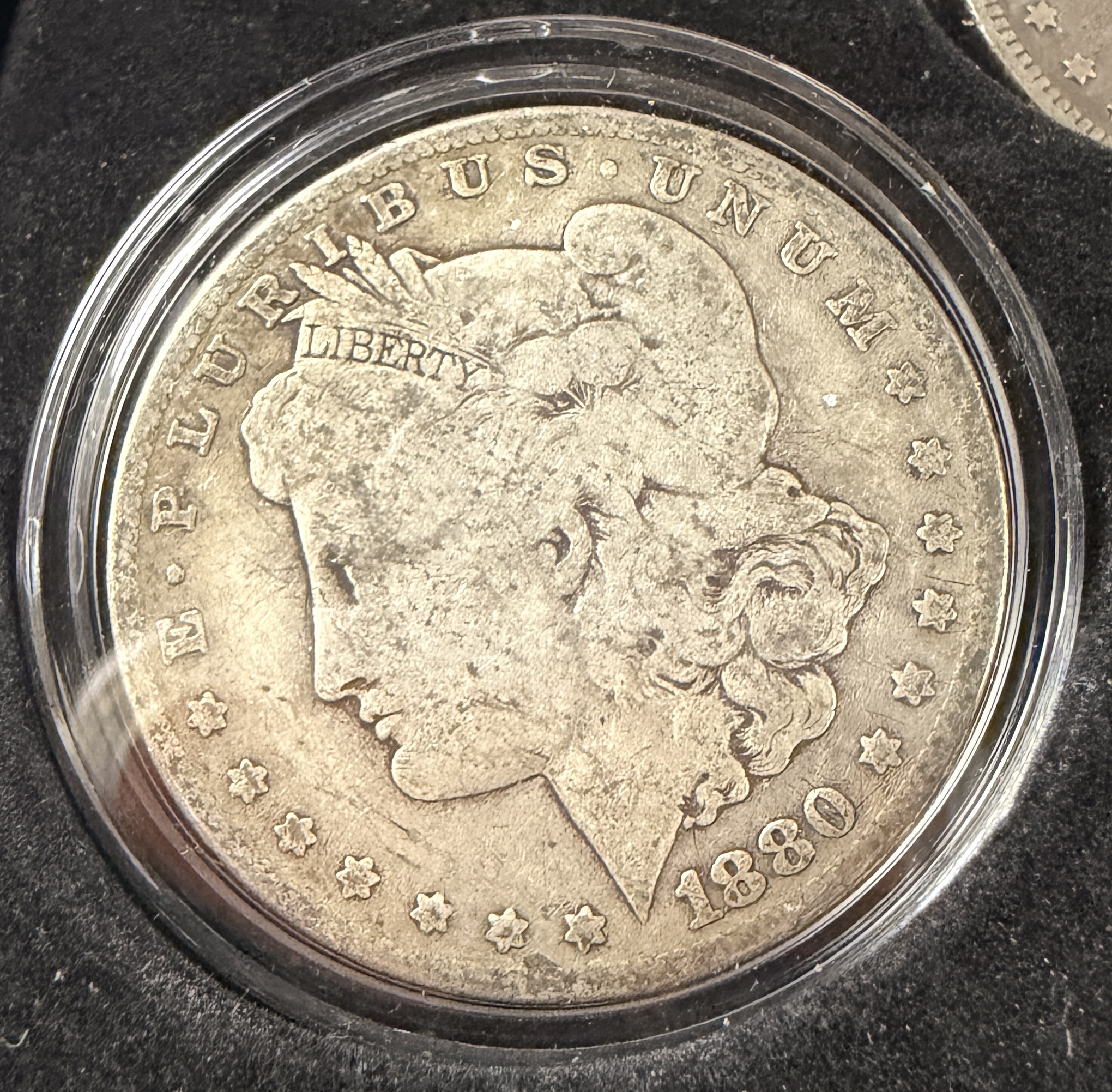 A Pair of US Morgan Silver Dollars, 1880-O and 1889-O Micro O Variety