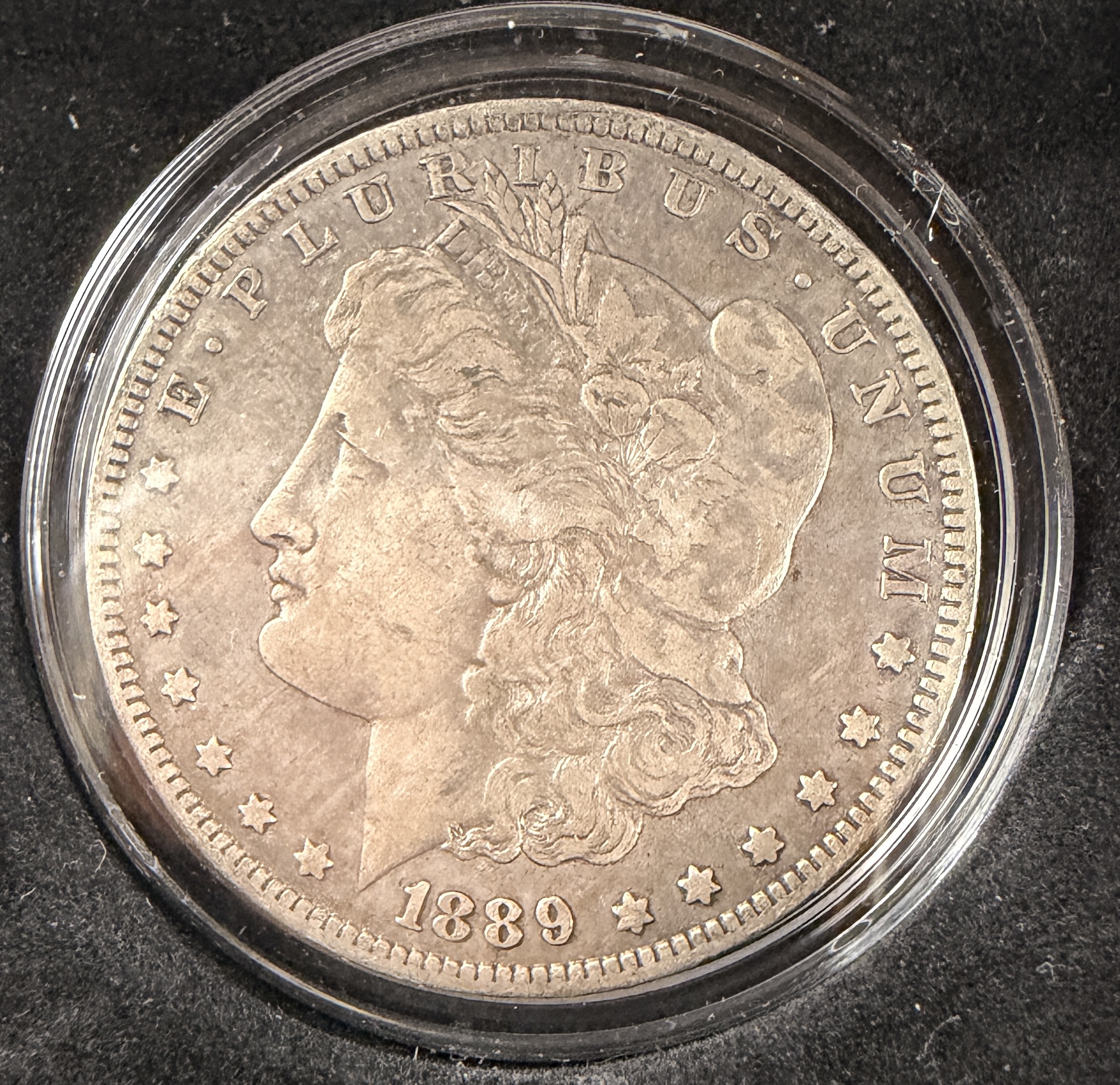 A Pair of US Morgan Silver Dollars, 1880-O and 1889-O Micro O Variety