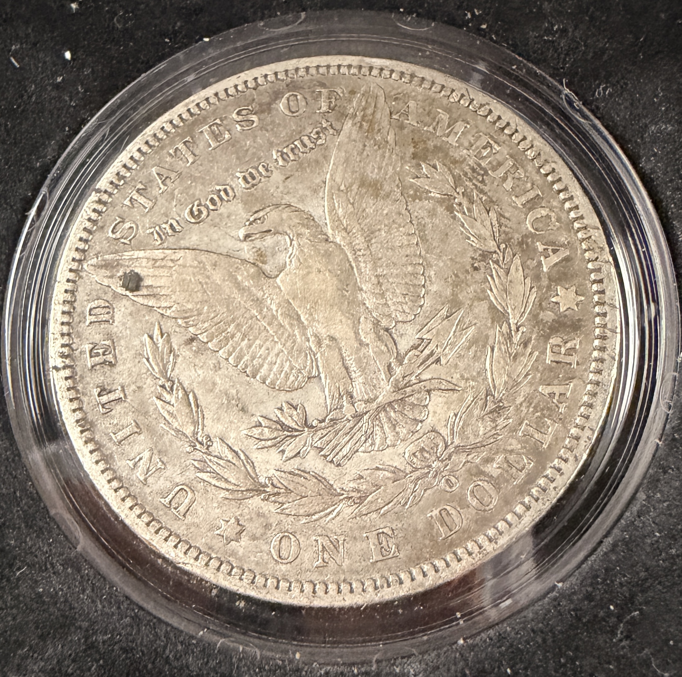 A Pair of US Morgan Silver Dollars, 1880-O and 1889-O Micro O Variety