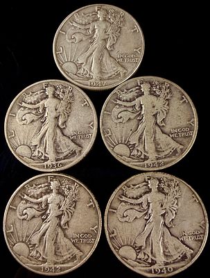 A Collection of US Walking Liberty Half Dollars. A collection of US Walking Liberty half dollars 