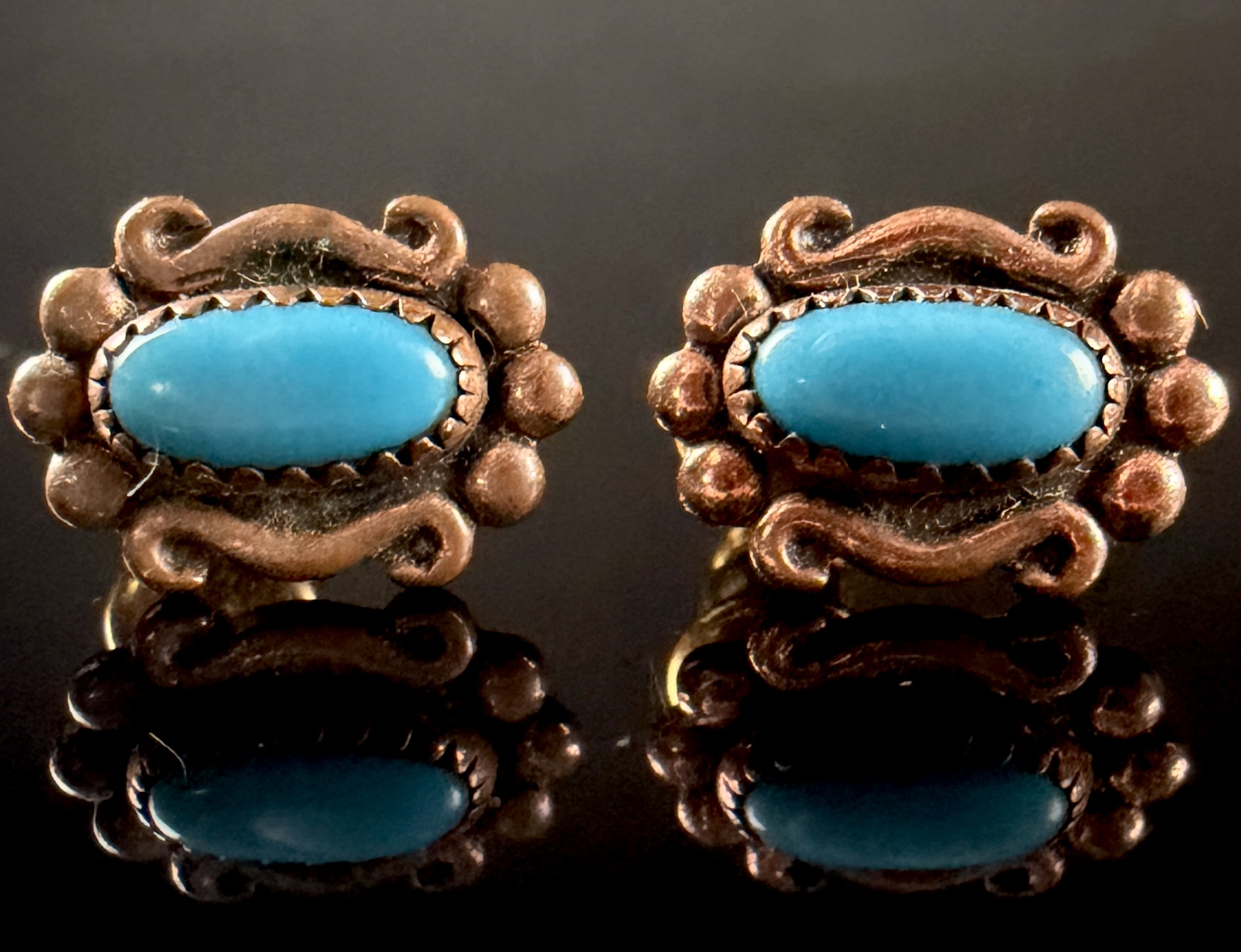 A Pair of Wheeler Manufacturing Copper and Turquoise Style Stud Earrings