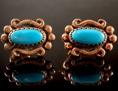 A Pair of Wheeler Manufacturing Copper and Turquoise Style Stud Earrings. This matched pair of 