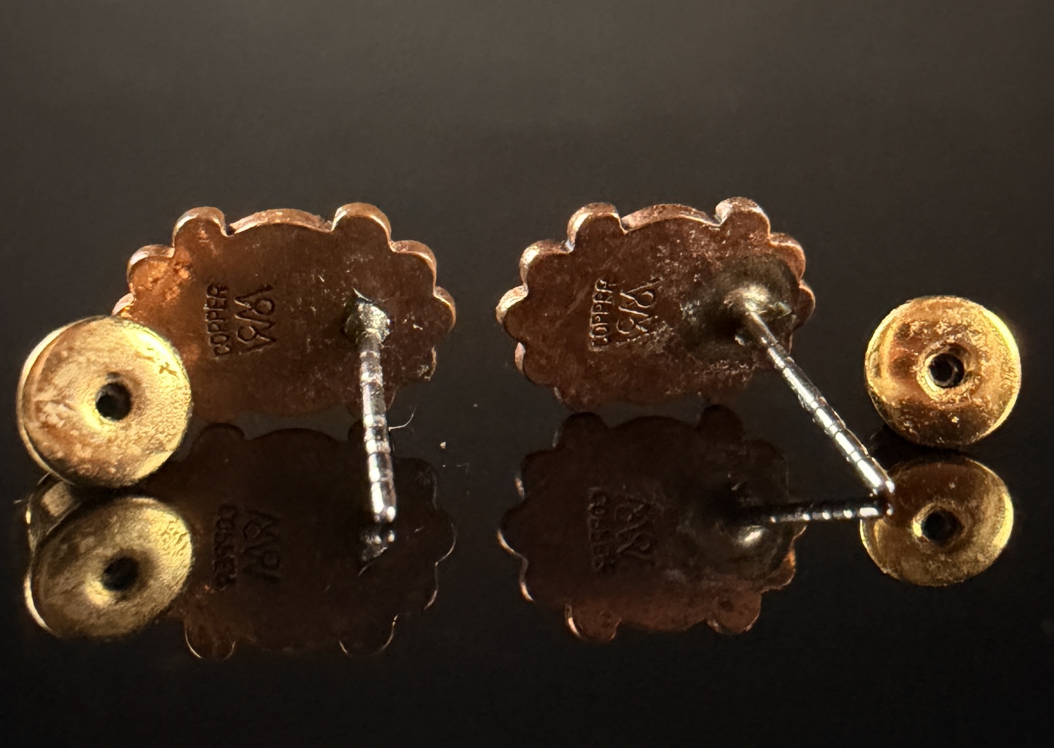 A Pair of Wheeler Manufacturing Copper and Turquoise Style Stud Earrings