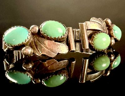 Southwestern Style Silver-Tone Expansion Bracelet with Light Green Cabochons. A 