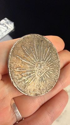 1896 Mo AM MX 8 Reales Silver Coin. This MX silver 8 Reales coin, identified as catalog number 