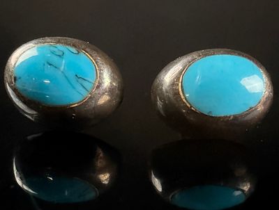 A Pair of Taxco Mexican Sterling Silver and Turquoise Stud Earrings. This matched pair of stud 
