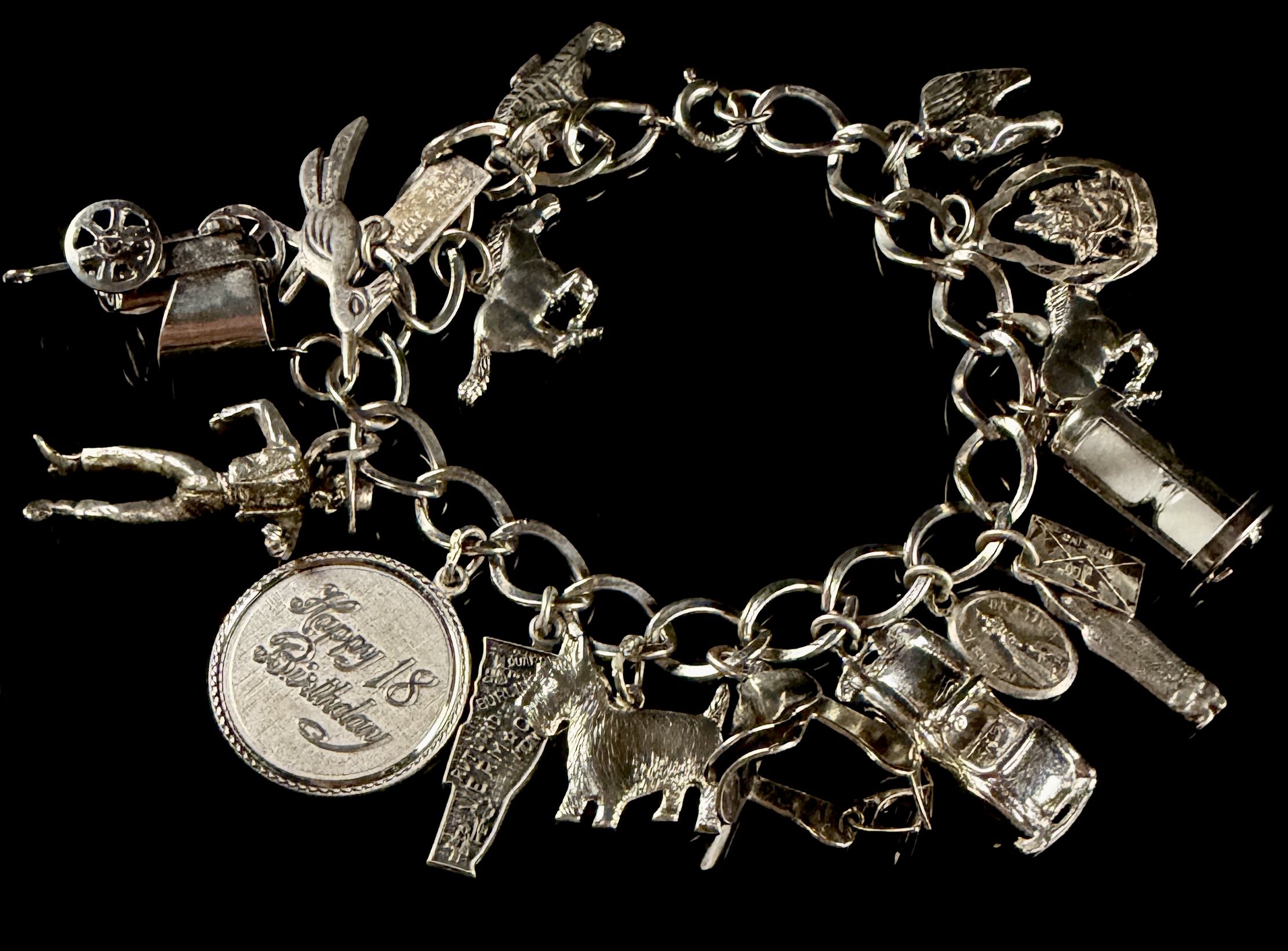 Vintage Sterling Silver Curb Link Bracelet with 18 Assorted Charms