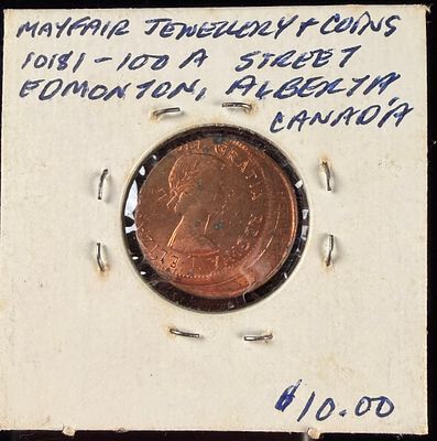 1962 Canada 1 Cent Off-Center Strike Error Coin. This 1962 Canada 1-cent coin features a major 