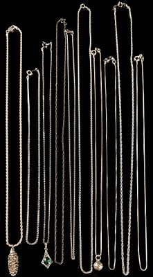 An Assortment of Eleven Sterling Silver Necklaces and Pendants. This lot consists of eleven 