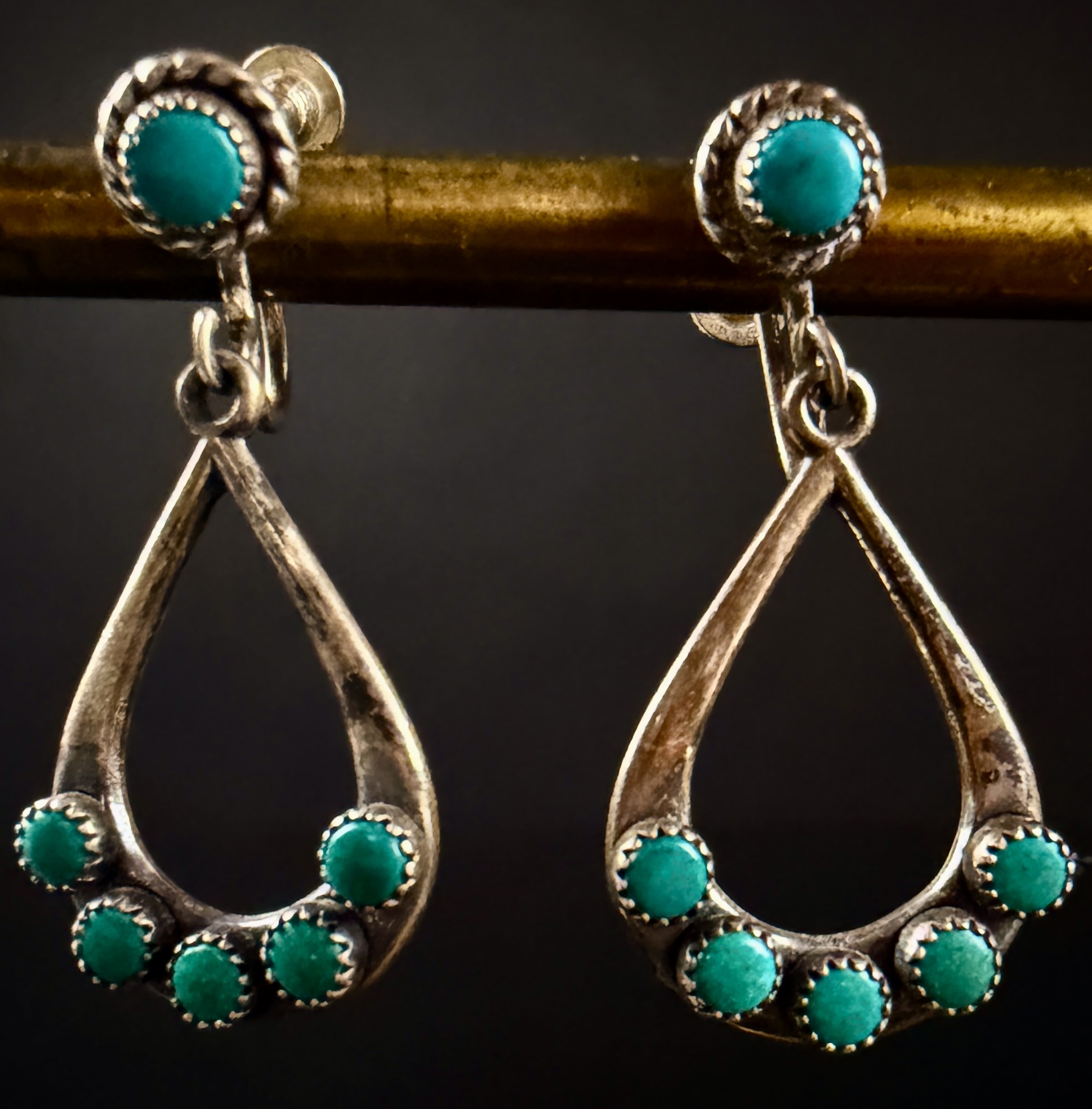 A Pair of Native American Navajo Style Sterling Silver and Turquoise Dangle Earrings