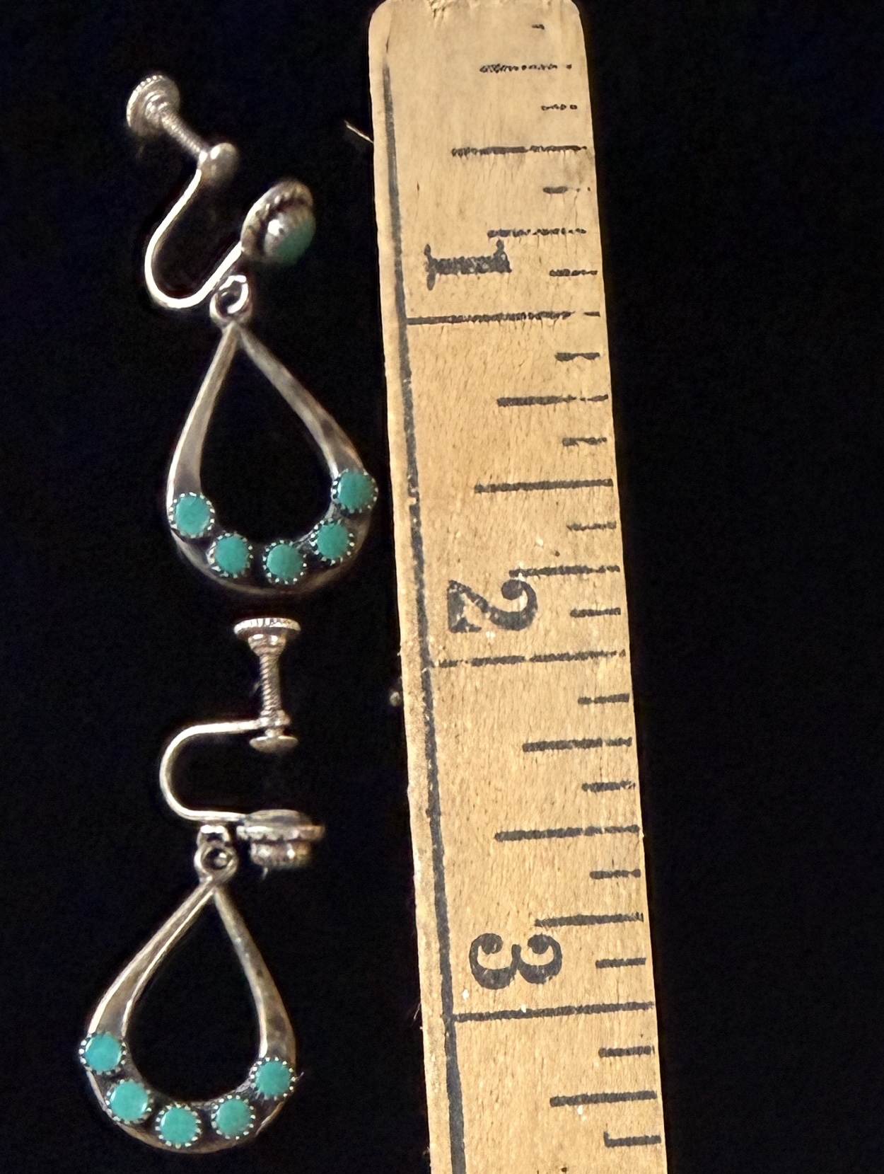 A Pair of Native American Navajo Style Sterling Silver and Turquoise Dangle Earrings