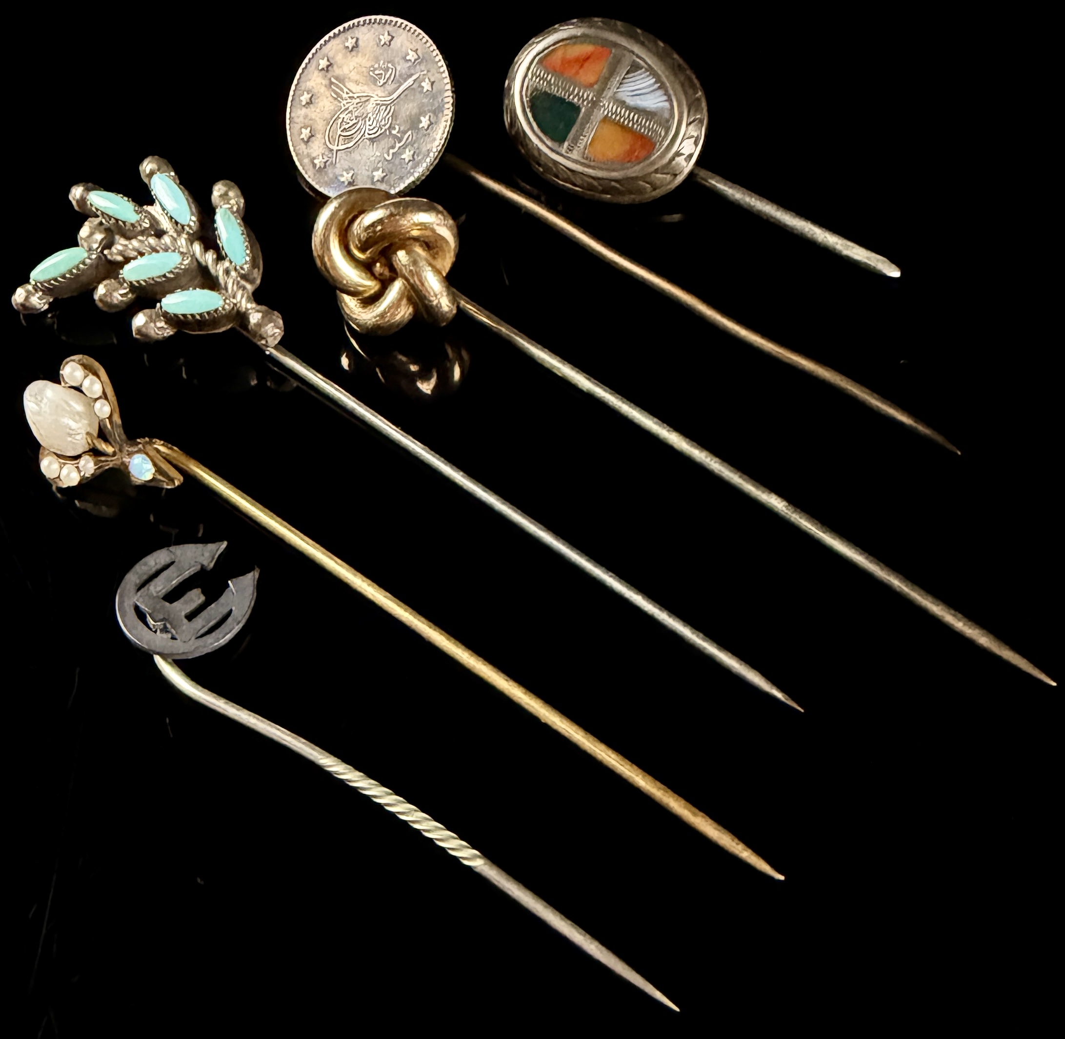 A Collection of Six Vintage and Antique Stick Pins