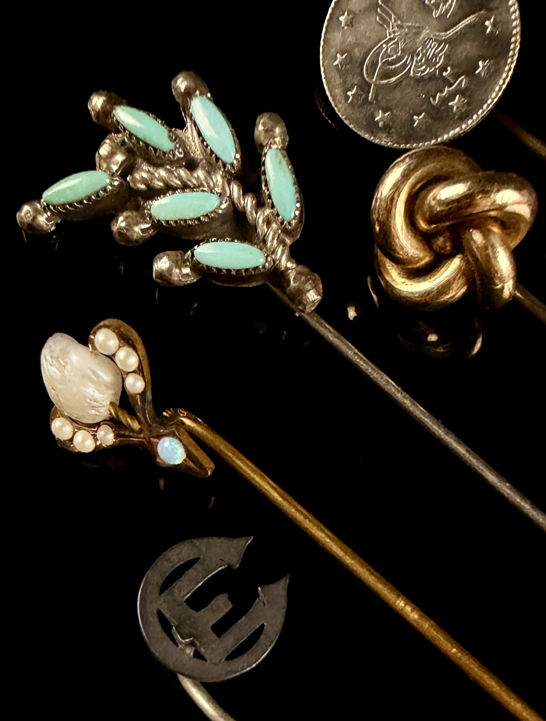 A Collection of Six Vintage and Antique Stick Pins