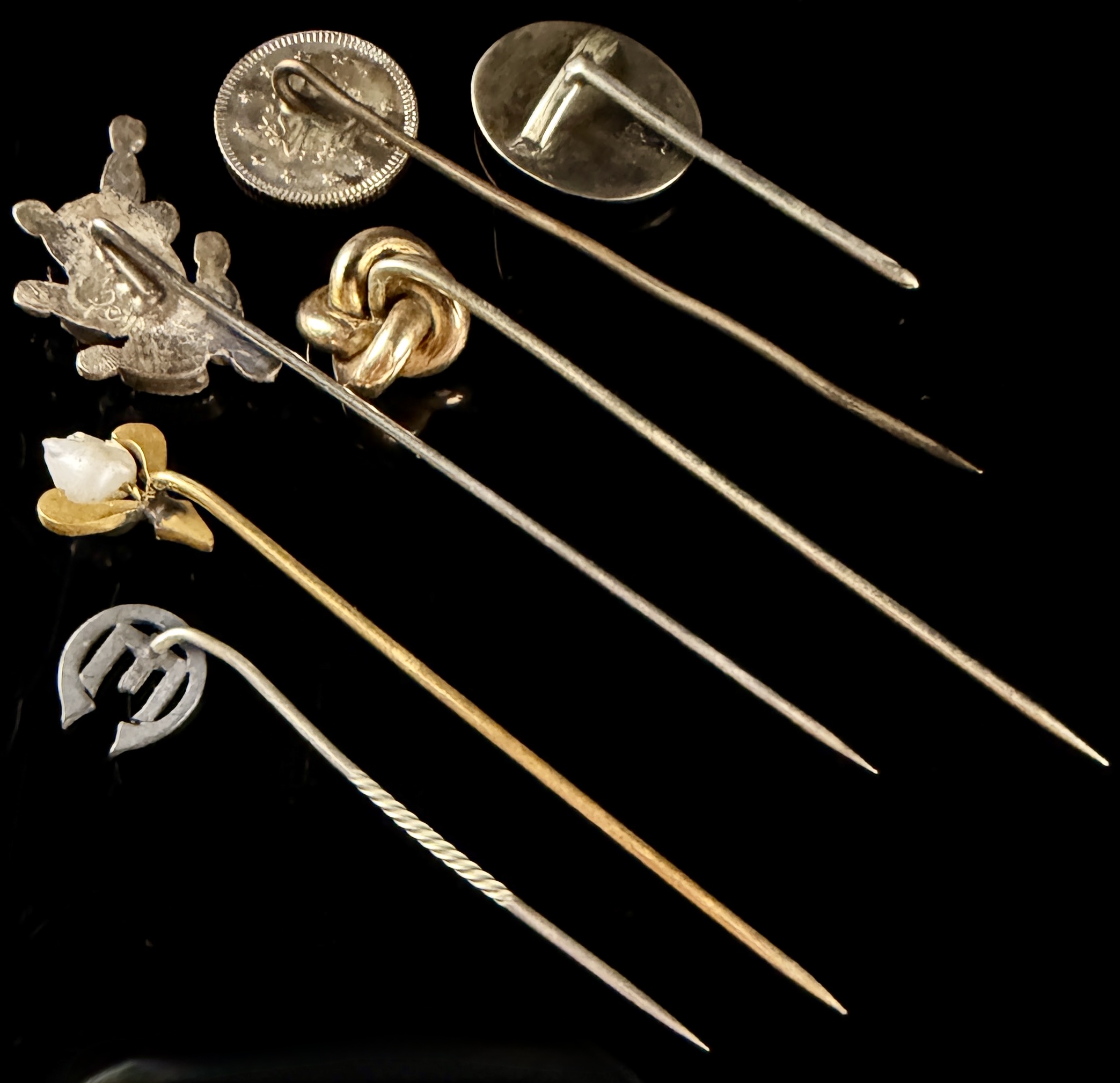 A Collection of Six Vintage and Antique Stick Pins