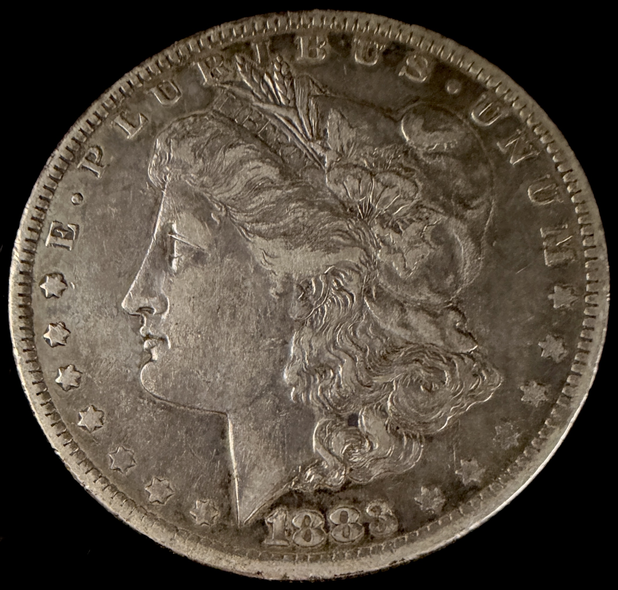 1883-O US Morgan Silver Dollar