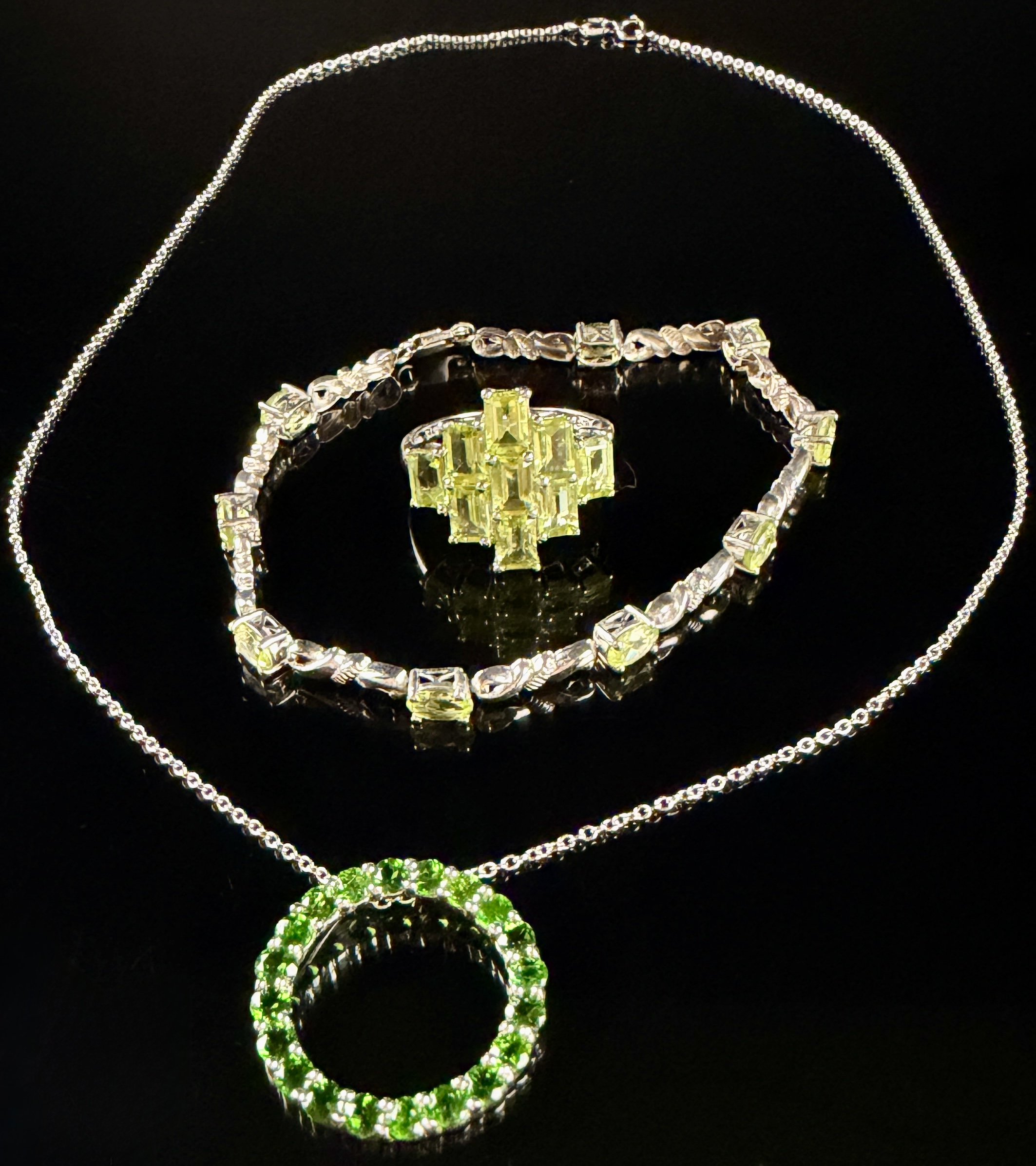 A Trio of Sterling Silver and Green Gemstone Jewelry