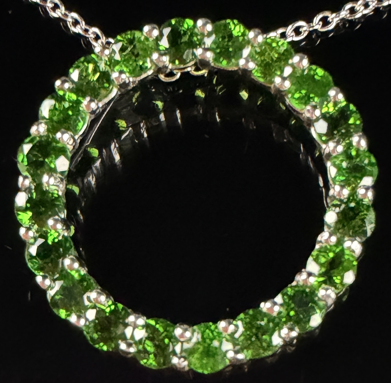 A Trio of Sterling Silver and Green Gemstone Jewelry