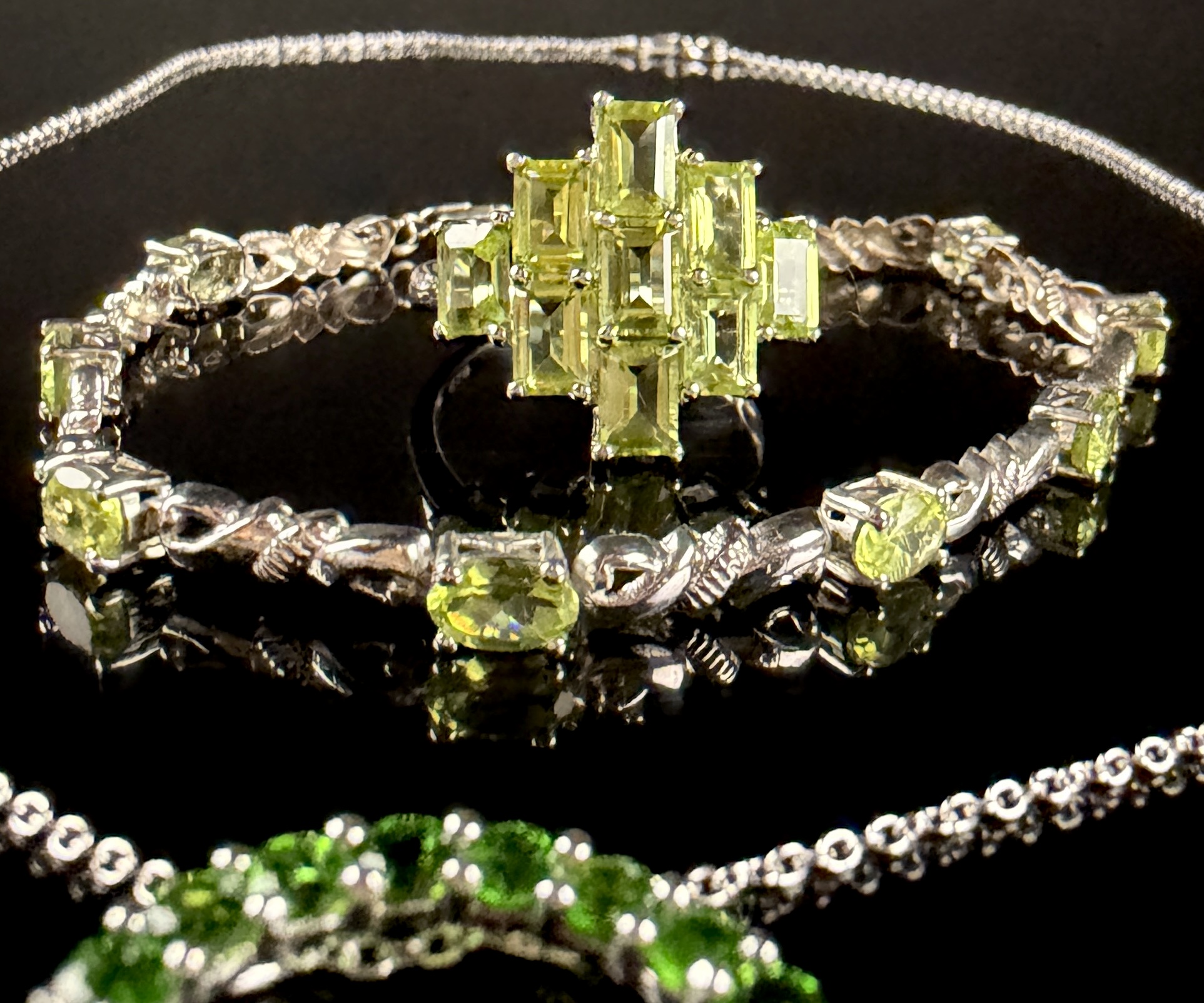A Trio of Sterling Silver and Green Gemstone Jewelry