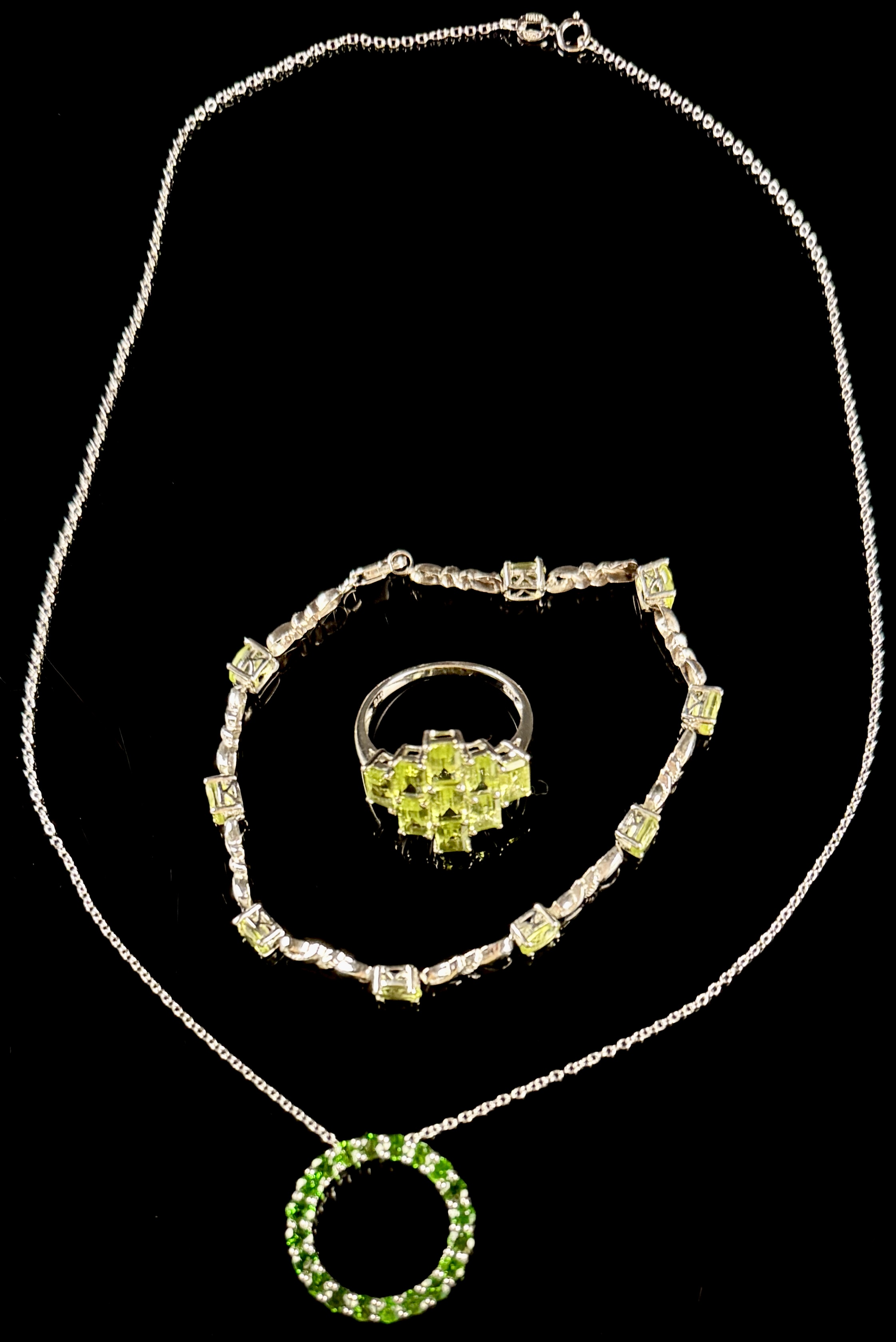 A Trio of Sterling Silver and Green Gemstone Jewelry