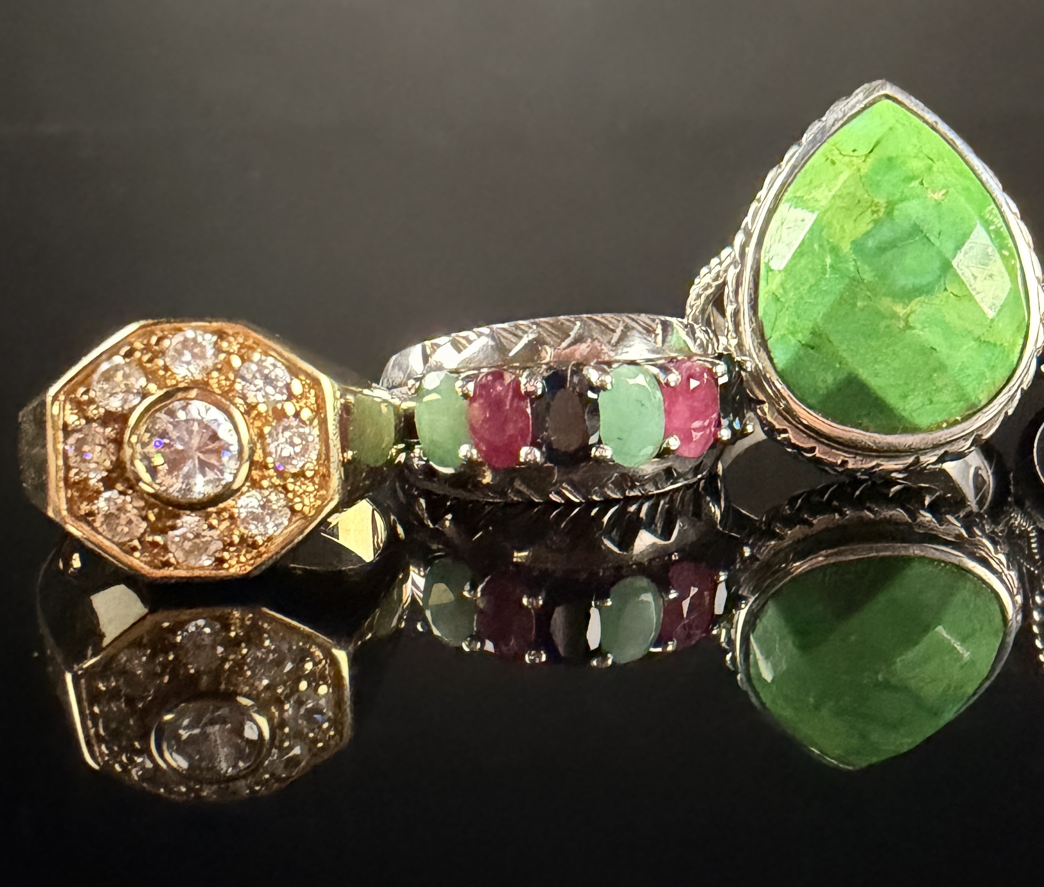A Collection of Six Sterling Silver and Gemstone Rings