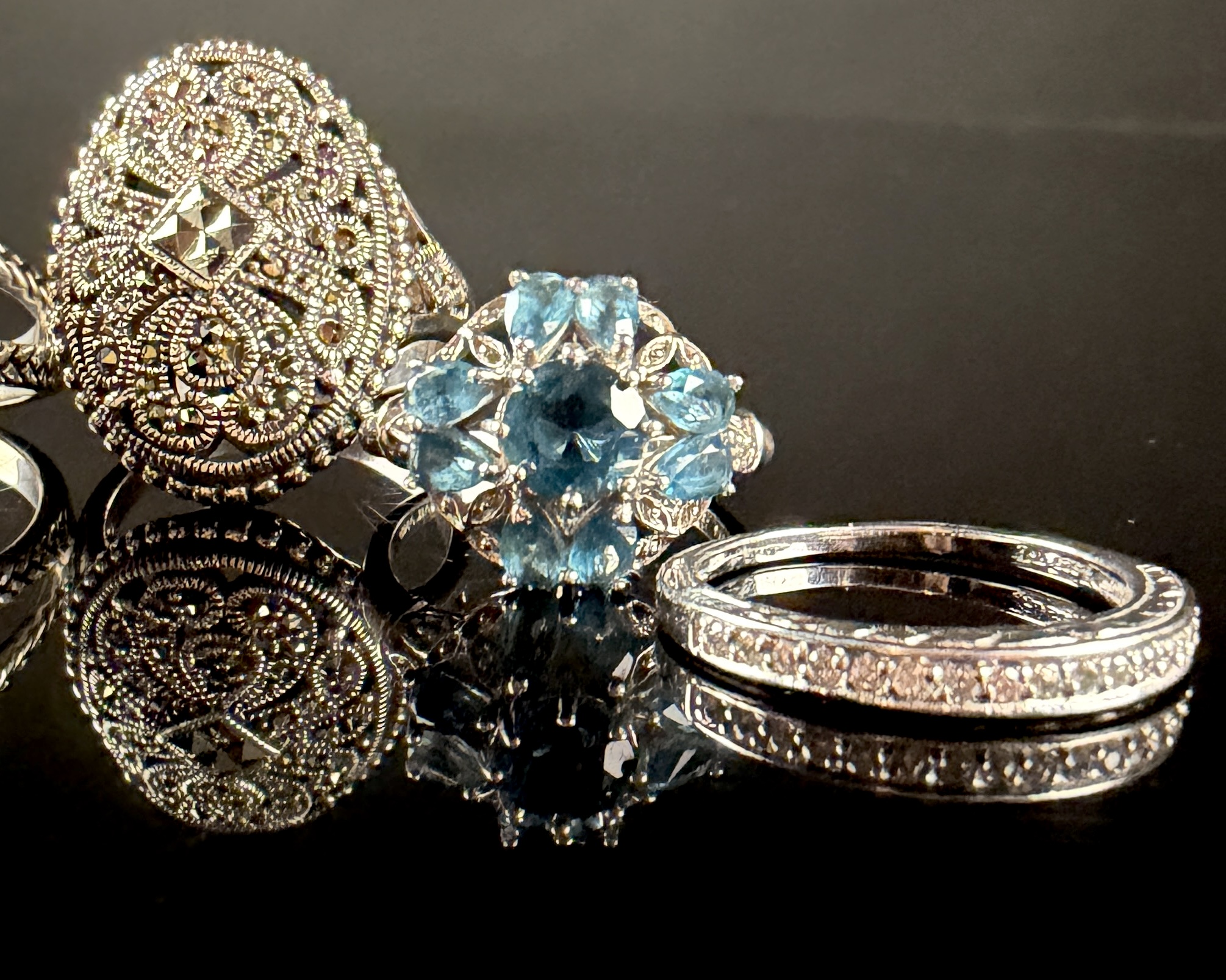 A Collection of Six Sterling Silver and Gemstone Rings