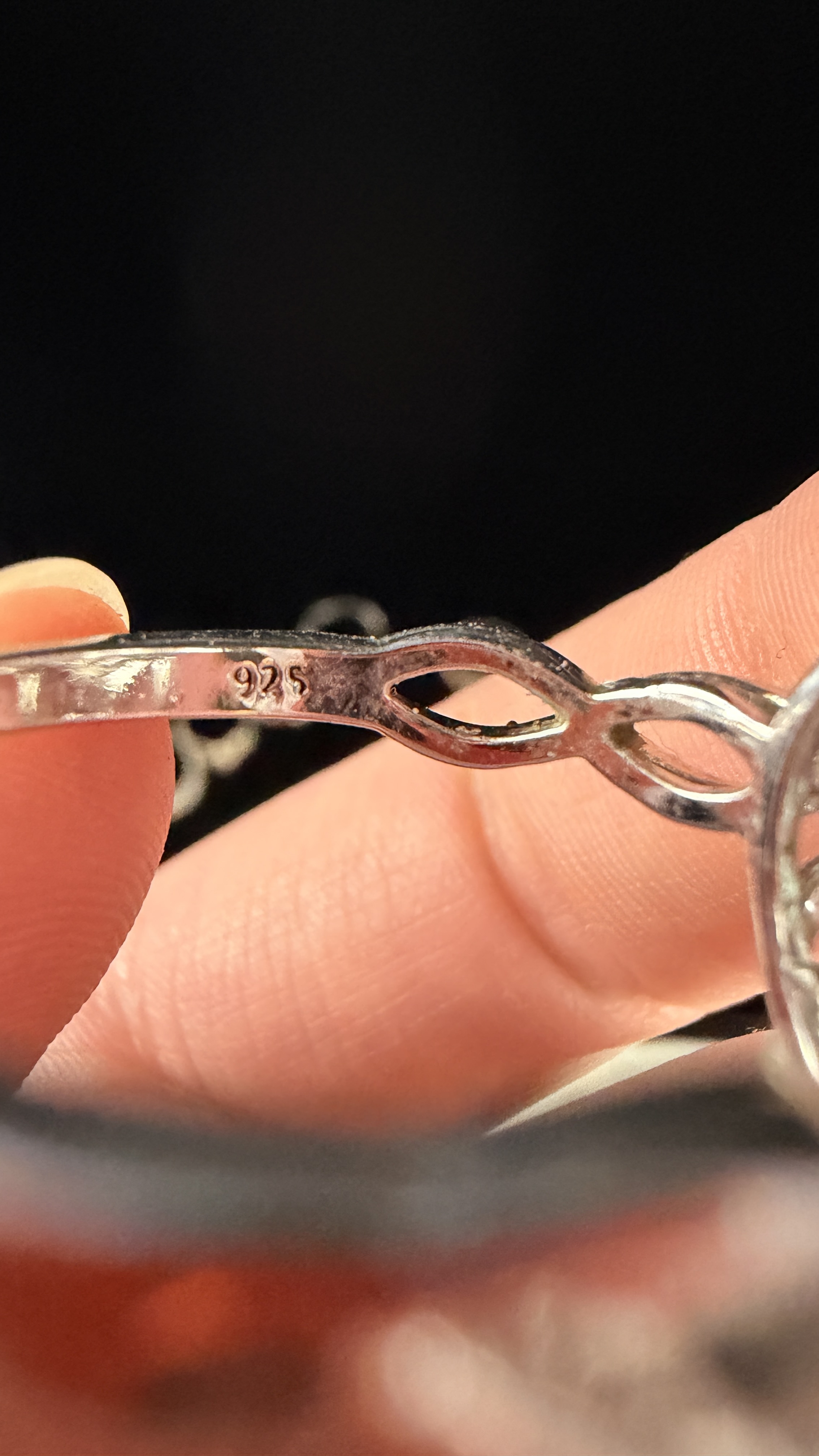 A Collection of Nine Sterling Silver Rings with Various Gemstones and Decorative Accents