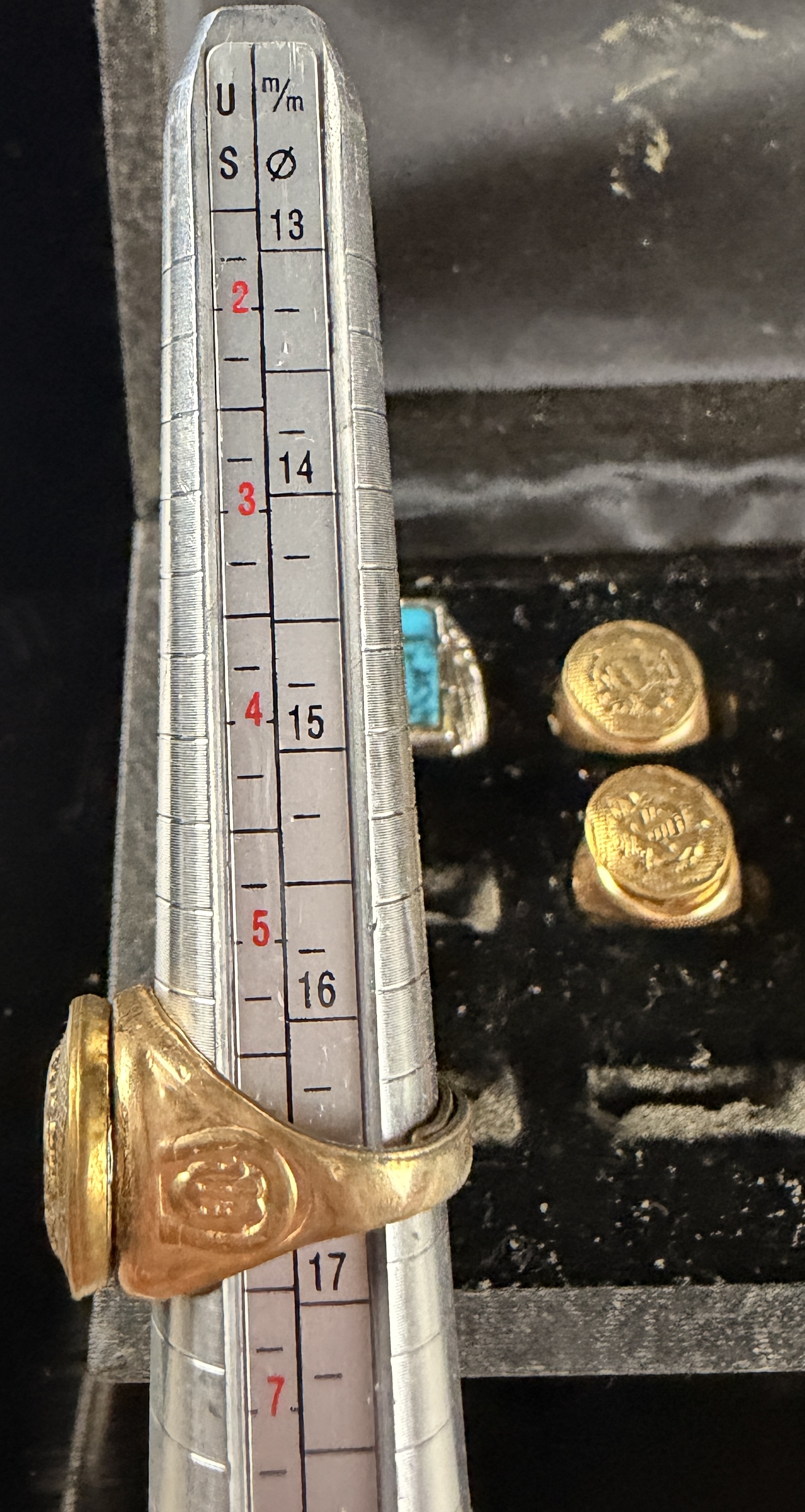 A Collection of Vintage Mixed Metal Rings and Heraldic Button Components