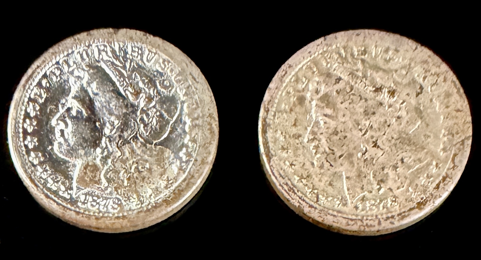 A Pair of US Historic Providence Mint Miniature Sterling Silver Morgan Dollars
