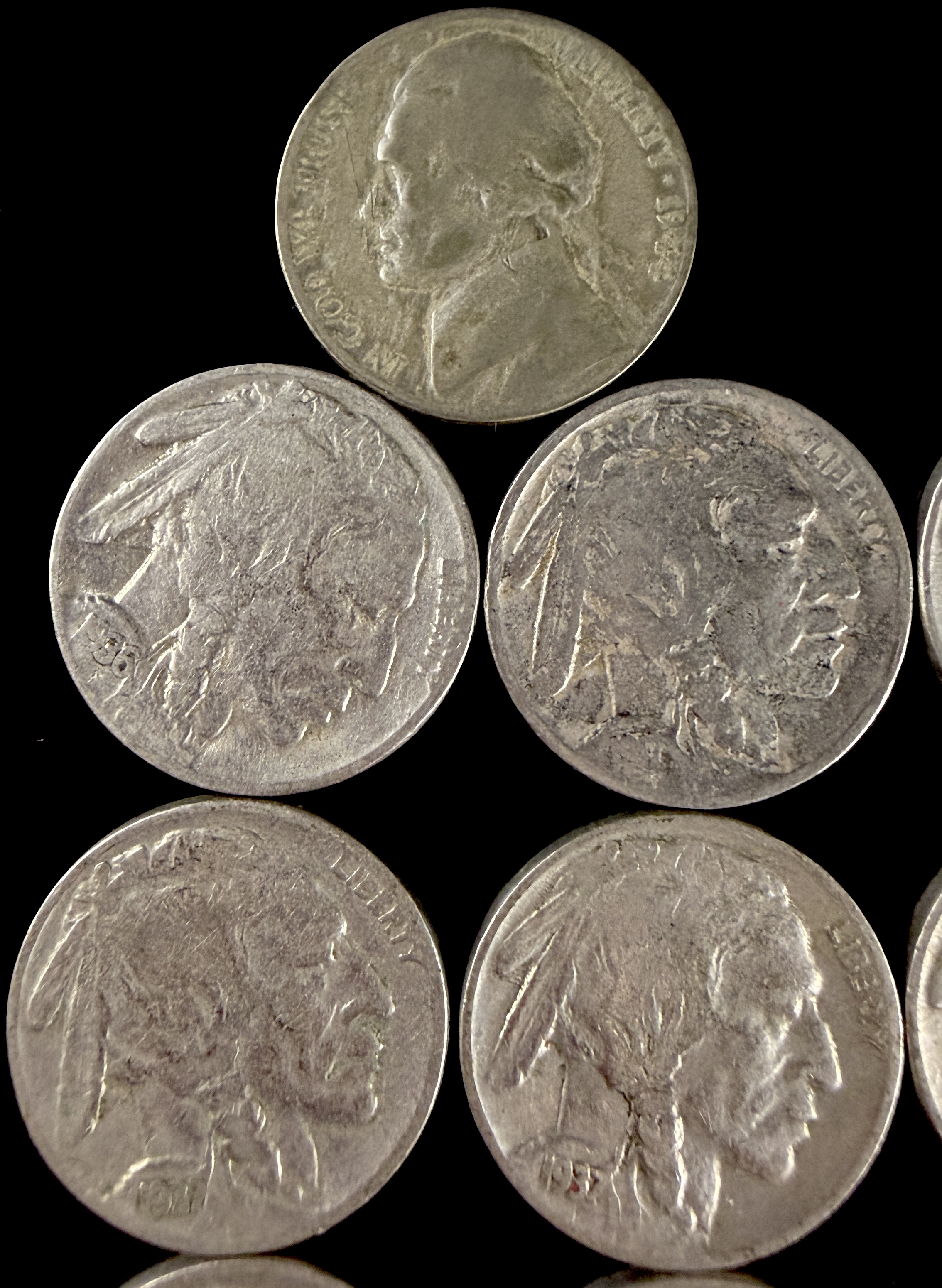 A Collection of US Five-Cent Coins Including Buffalo Nickels and Jefferson Silver War Nickel
