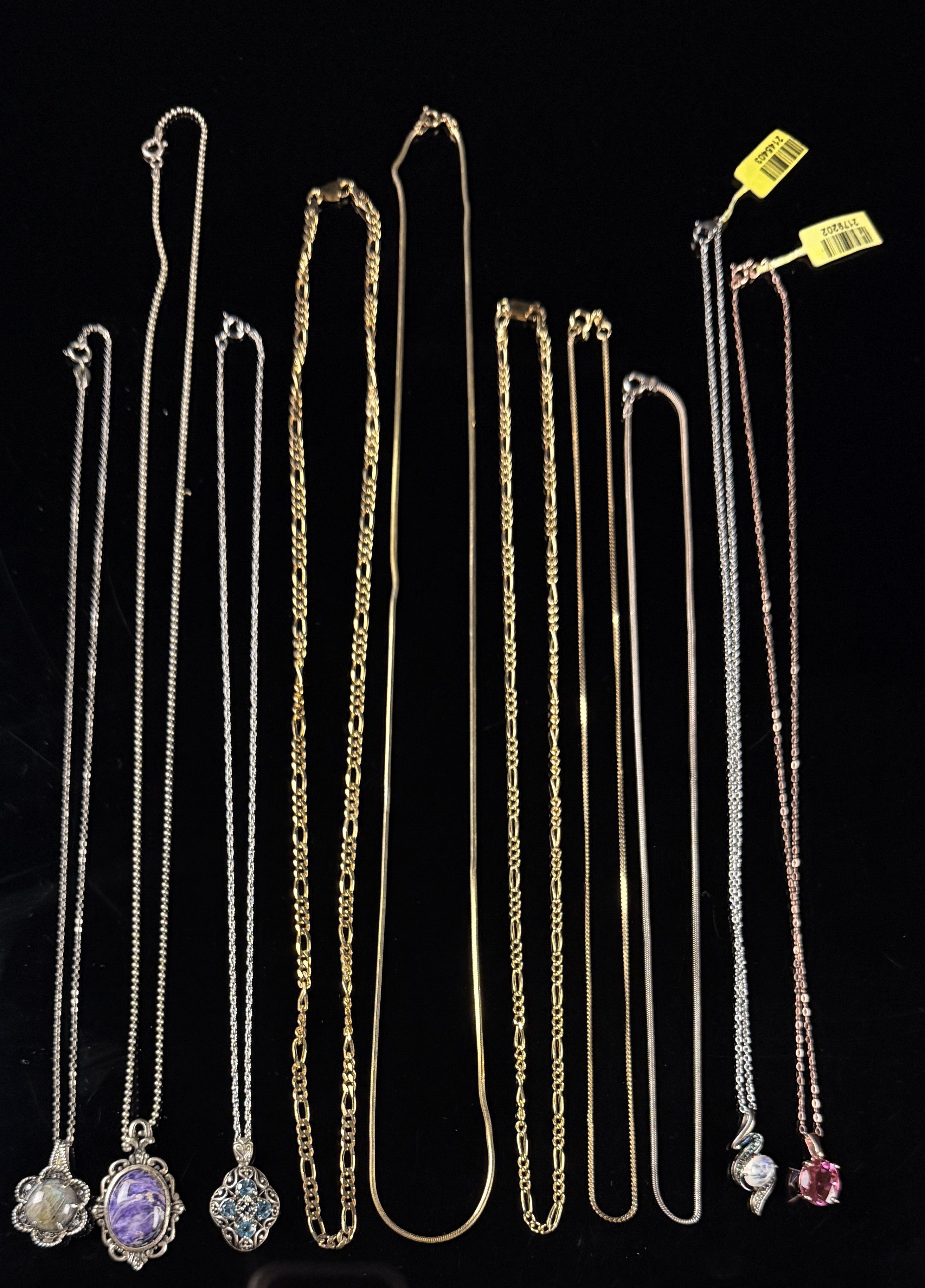 A Collection of eleven sterling silver necklaces and gemstone pendants