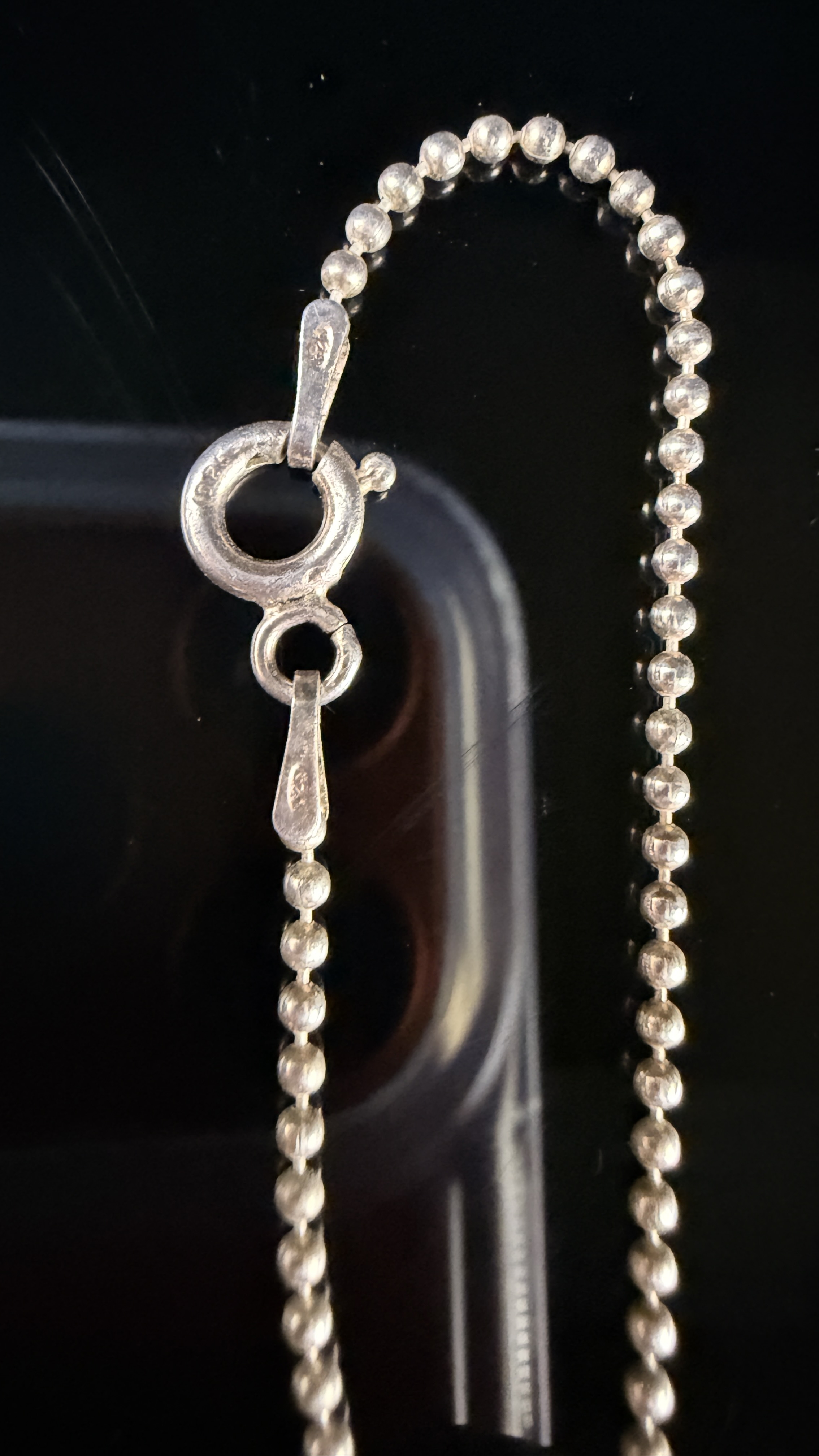 A Collection of eleven sterling silver necklaces and gemstone pendants