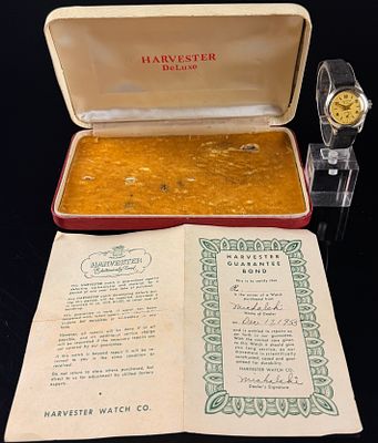 Vintage 1955 Harvester De Luxe Manual Wind Wristwatch with Box and Papers, Does Not Run. This 