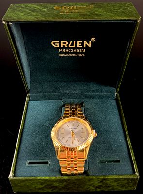 Gruen Precision Gold-Tone Quartz Wristwatch with Box and Papers. A Gruen Precision gold-tone 
