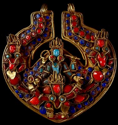 A Large Nepalese Gilded Metal Pectoral Pendant Set with Coral Turquoise and Lapis Lazuli. This 