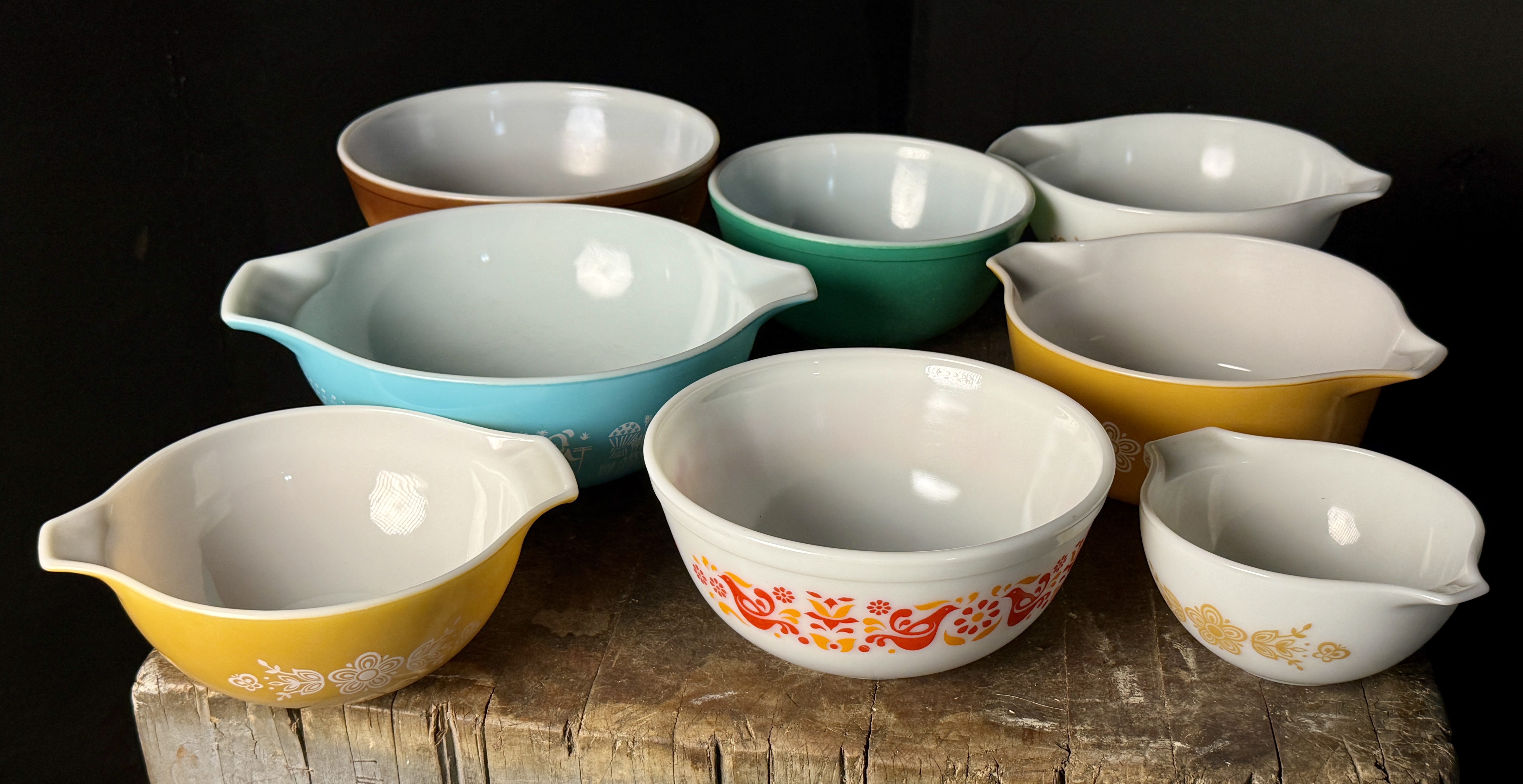 Nine Piece Collection of Vintage Pyrex Opal Glass Bowls in Friendship, Butterprint, and Butterfly Gold Patterns