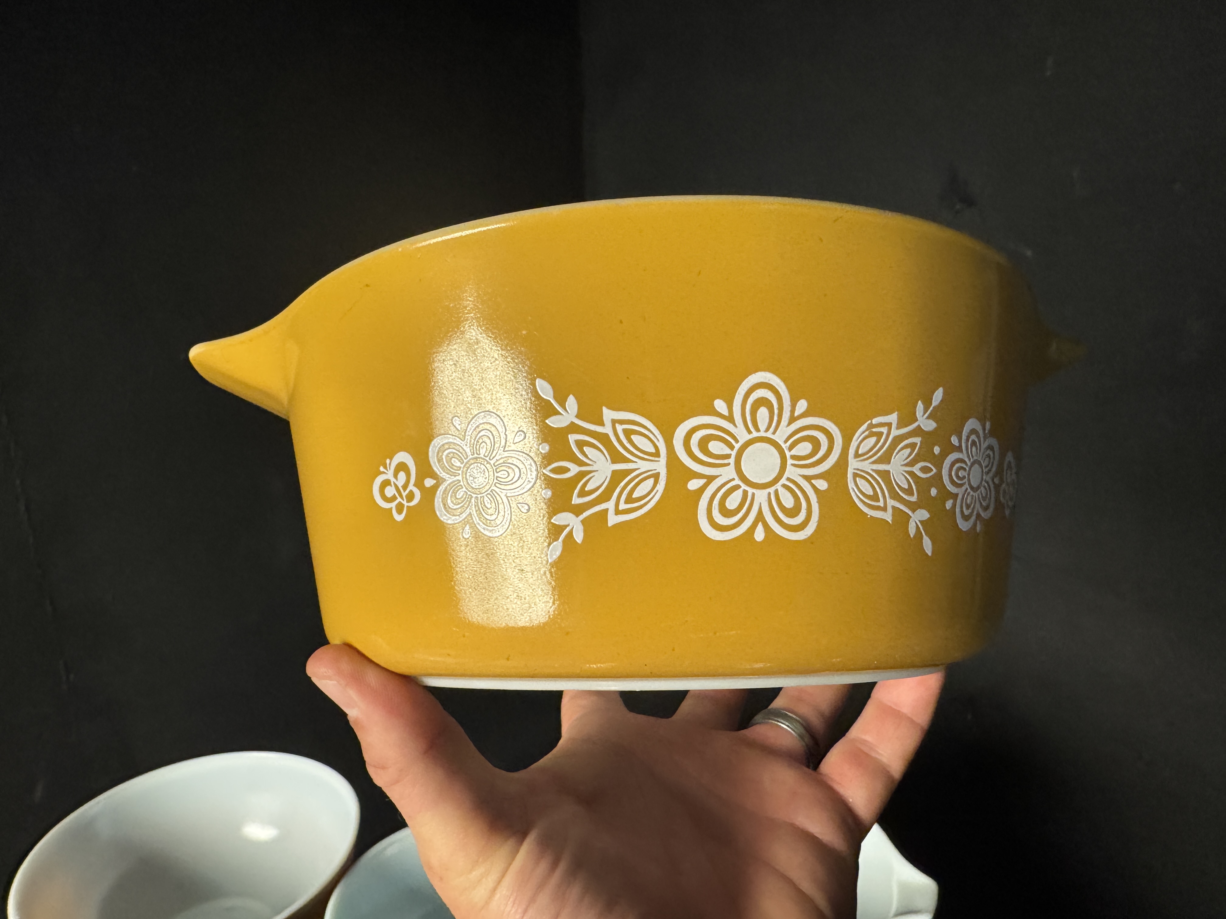 Nine Piece Collection of Vintage Pyrex Opal Glass Bowls in Friendship, Butterprint, and Butterfly Gold Patterns