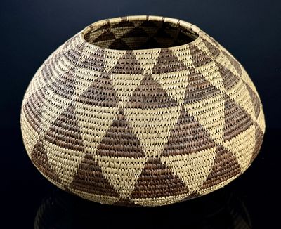 Large Native American Coiled Globular Storage Basket. This large globular storage basket is 