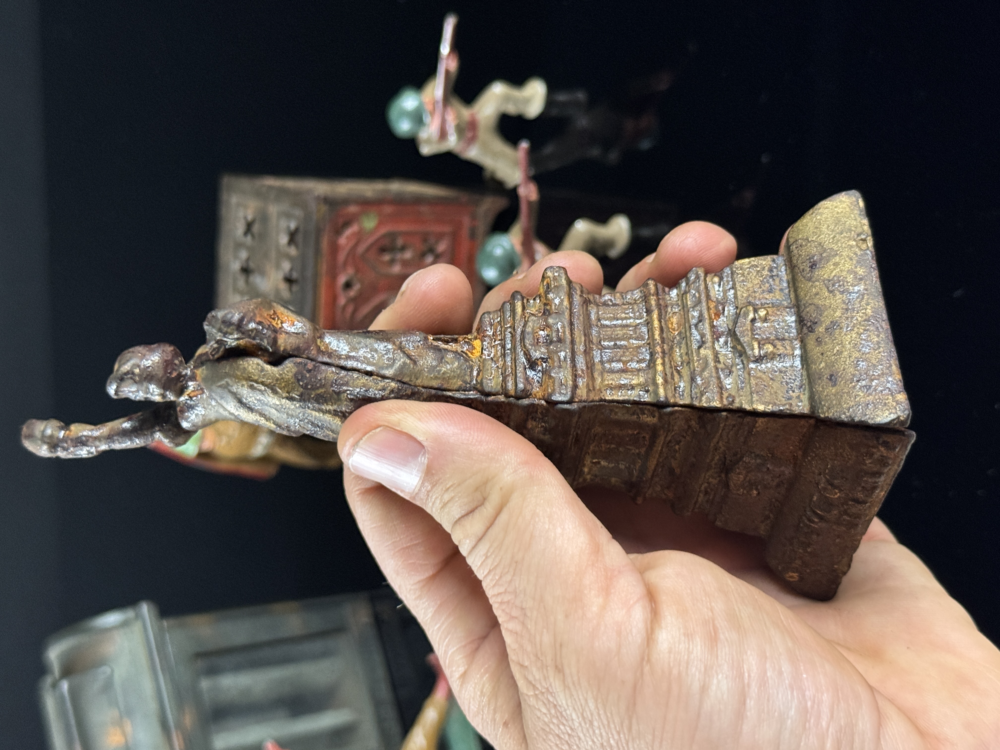 A Collection of Vintage Cast Metal Savings Banks and Military Figures